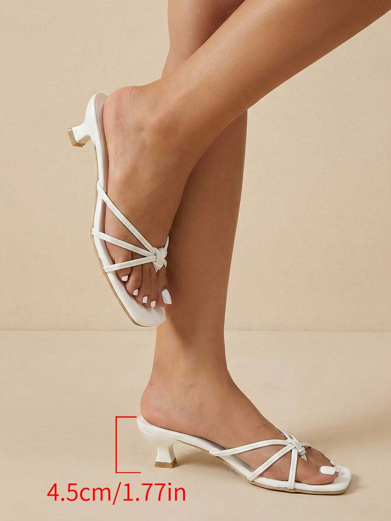 Elegant women’s slip-on high heel sandals with a square toe, bowknot detail, textured upper, stiletto heel, and slingback toe-post design.