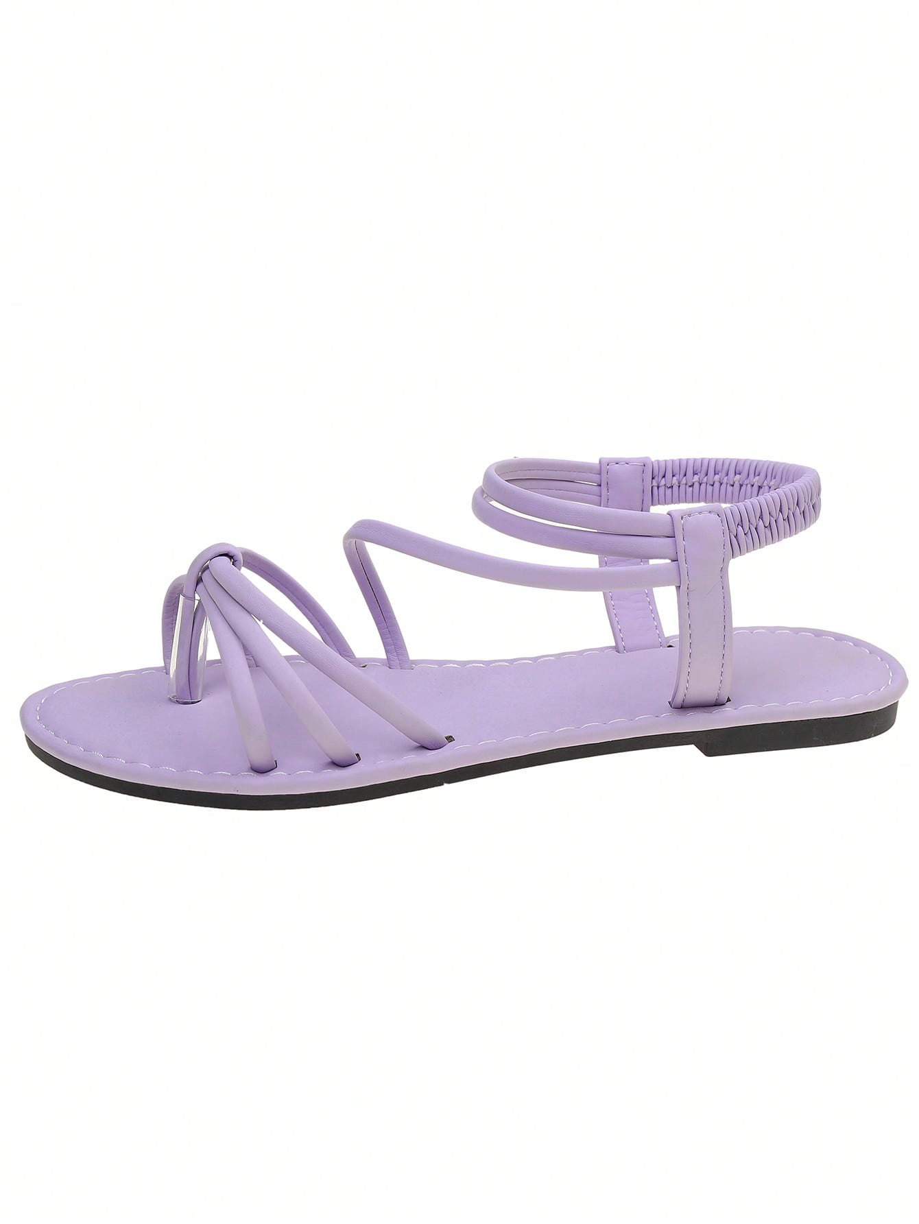 Women's minimalist flat open-toe sandals with thin straps and a toe-ring toe post design.