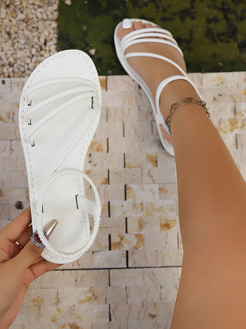 Women's minimalist multi-strap flat open-toe sandals in a classic casual style for daily wear, commuting, beach, travel, gatherings, and holidays.