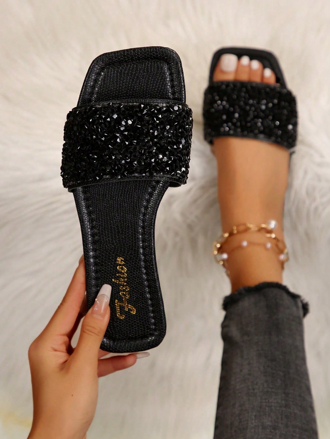 Black plus size women's slip-on flat slide sandals with square open toe, soft non-slip sole, and pearl rhinestone embellishments.