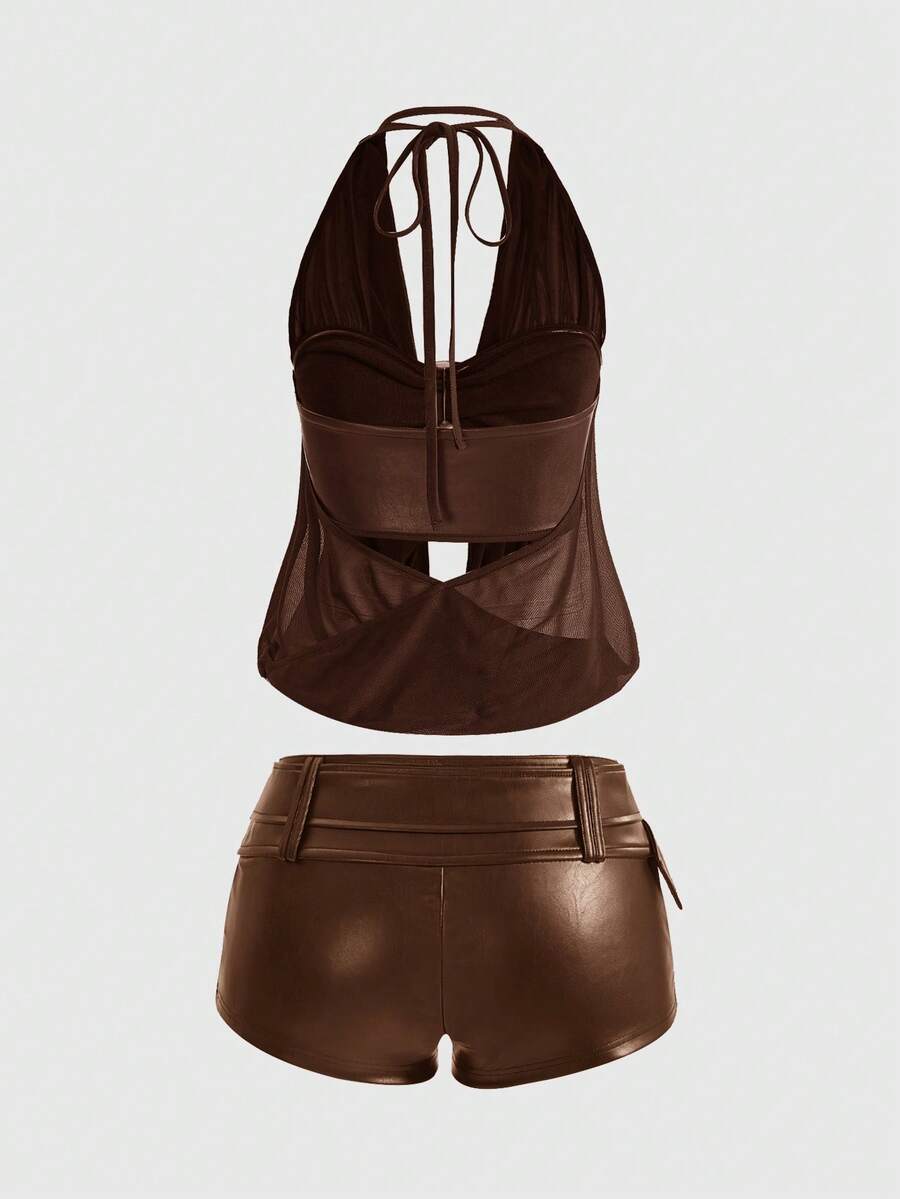 Women's Gyaru-style two-piece outfit with a draped halter crop top, backless tie detail, and mini bodycon shorts