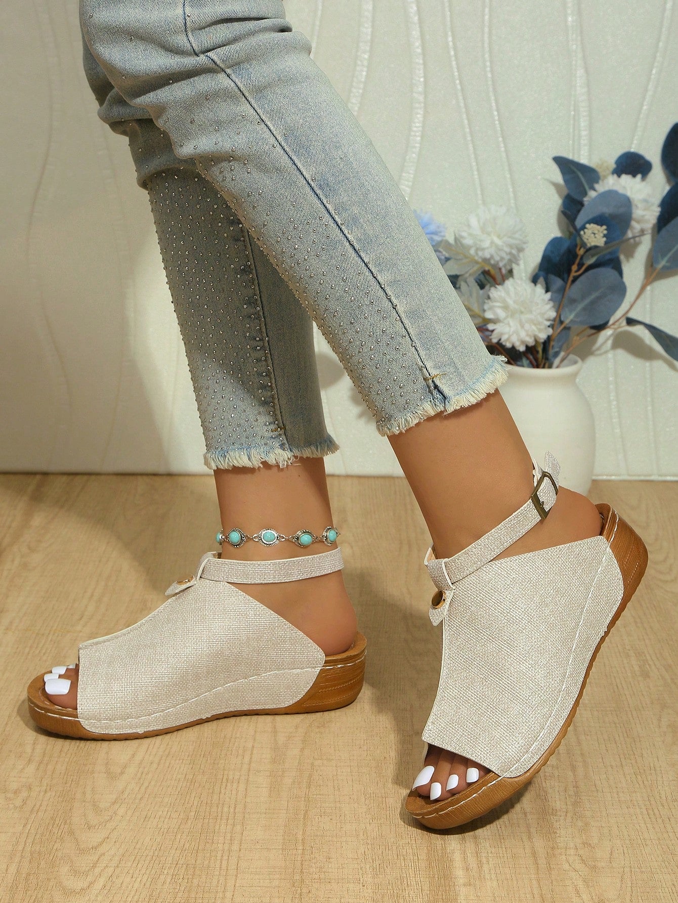 Women's open-toe platform wedge beach sandals with thick sole, stitching detail, floral accents, buckle closure, and removable adjustable shoelaces.