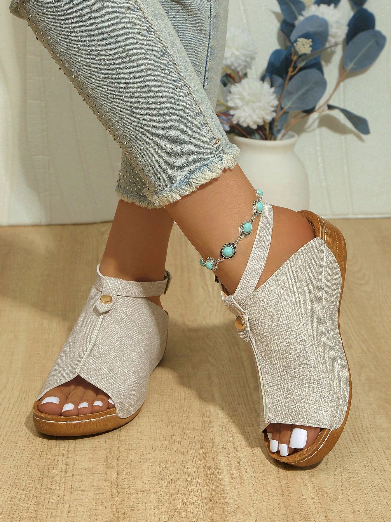 Women's open-toe platform wedge beach sandals with thick sole, stitching detail, floral accents, buckle closure, and removable adjustable shoelaces.
