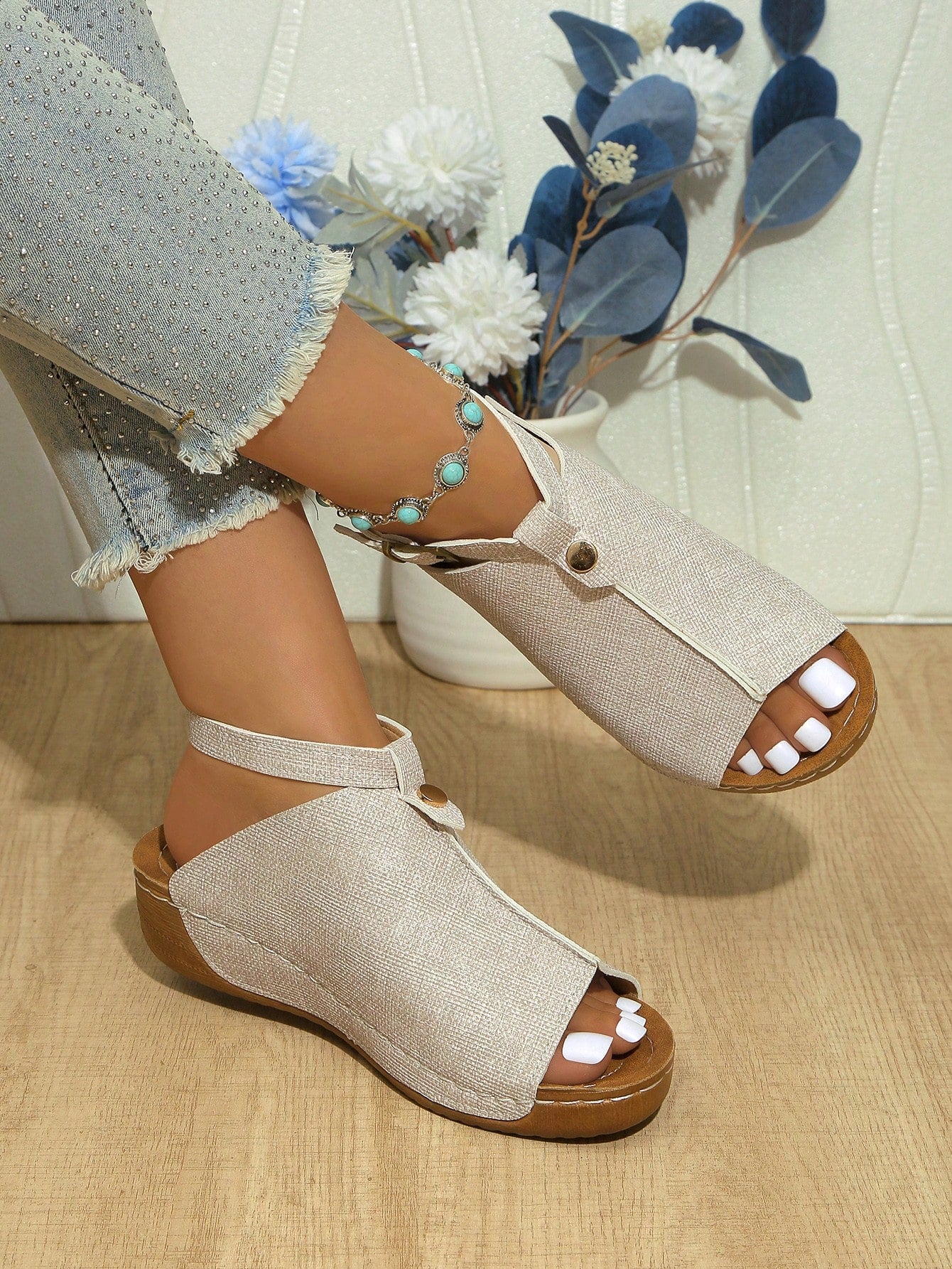 Women's open-toe platform wedge beach sandals with thick sole, stitching detail, floral accents, buckle closure, and removable adjustable shoelaces.