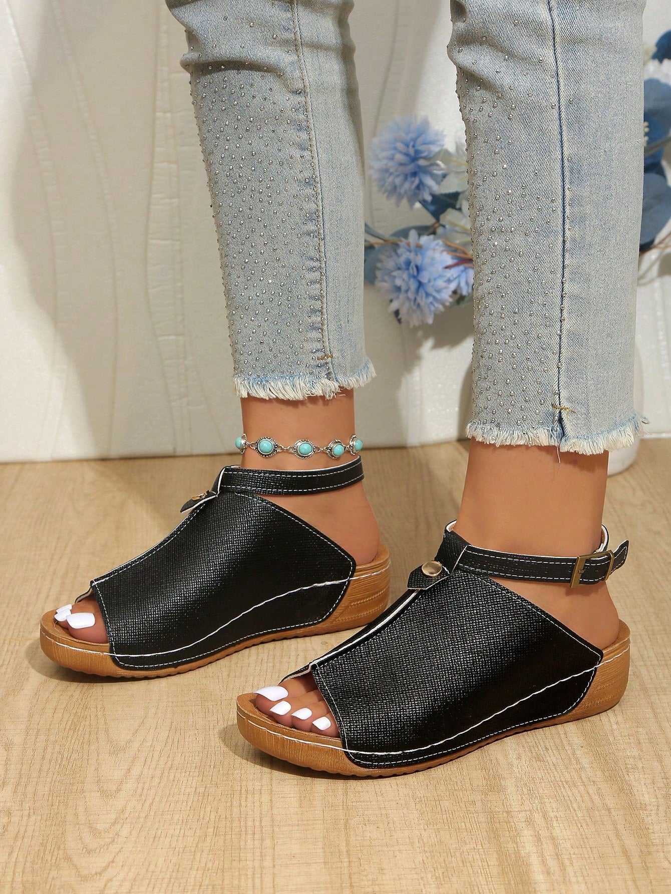 Women's open-toe platform wedge beach sandals with thick sole, stitching detail, floral accents, buckle closure, and removable adjustable shoelaces.