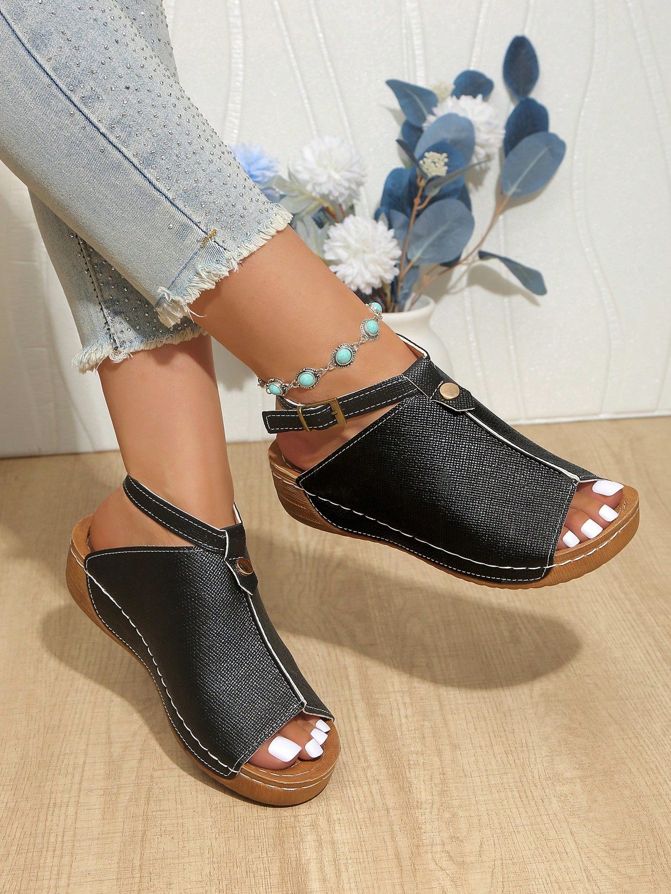 Women's open-toe platform wedge beach sandals with thick sole, stitching detail, floral accents, buckle closure, and removable adjustable shoelaces.