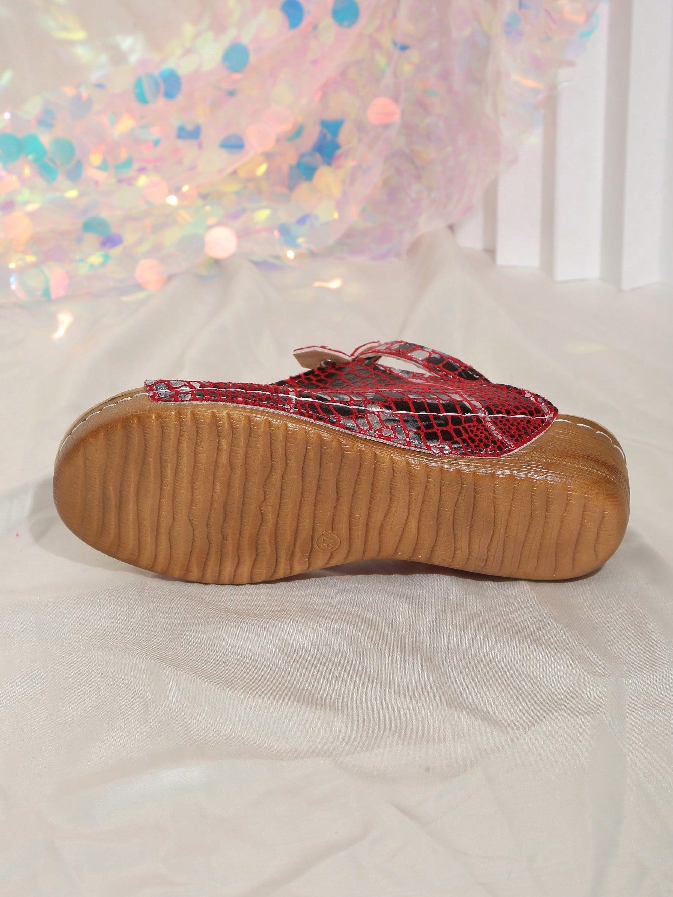 Women's open-toe platform wedge beach sandals with thick sole, stitching detail, floral accents, buckle closure, and removable adjustable shoelaces.