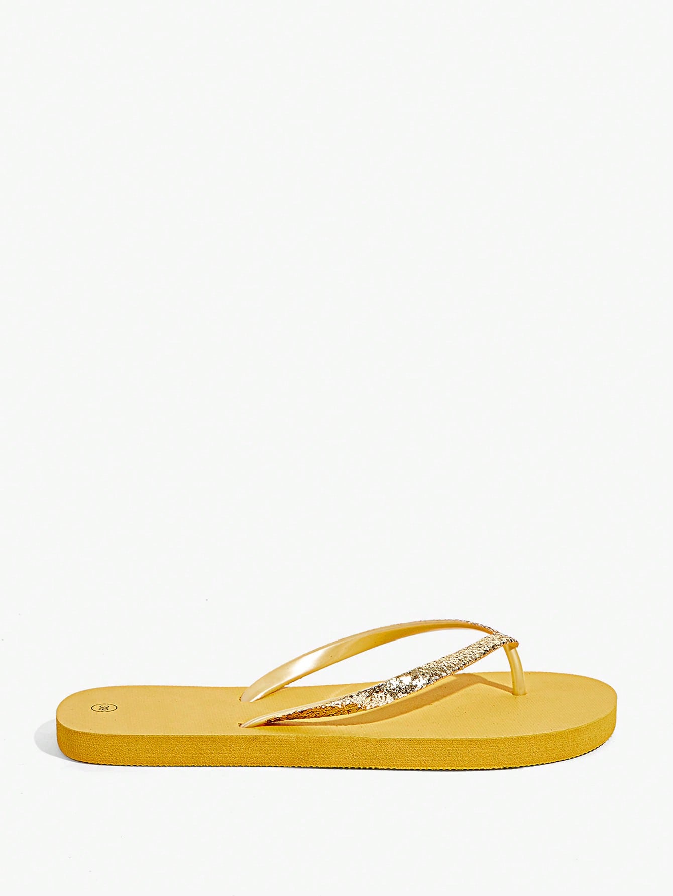 Pair of women’s apricot flat flip-flops with a glitter upper and plain design, suitable for beach, outdoor, home, and vacation wear.