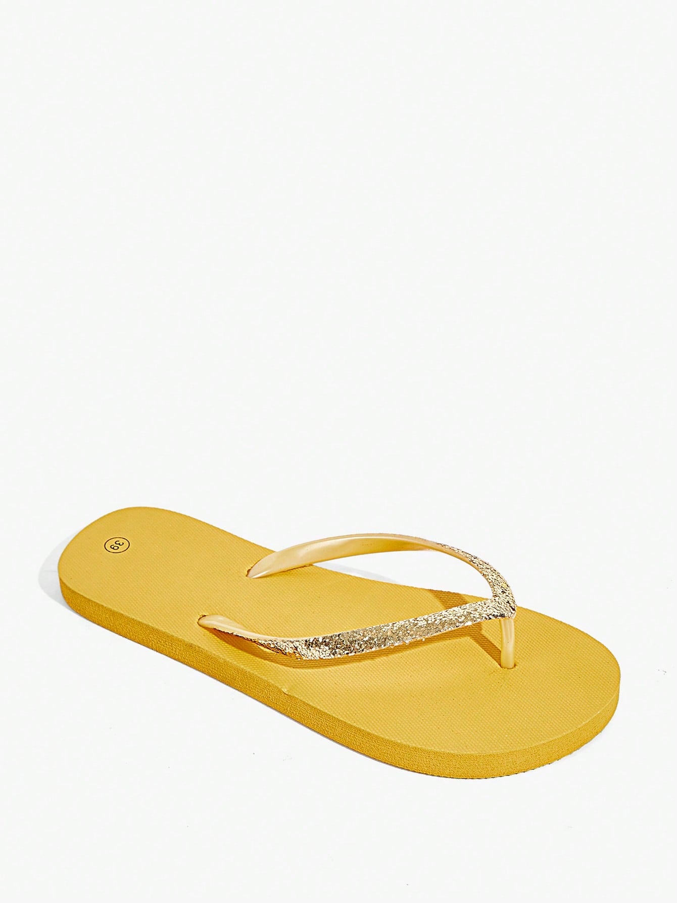 Pair of women’s apricot flat flip-flops with a glitter upper and plain design, suitable for beach, outdoor, home, and vacation wear.