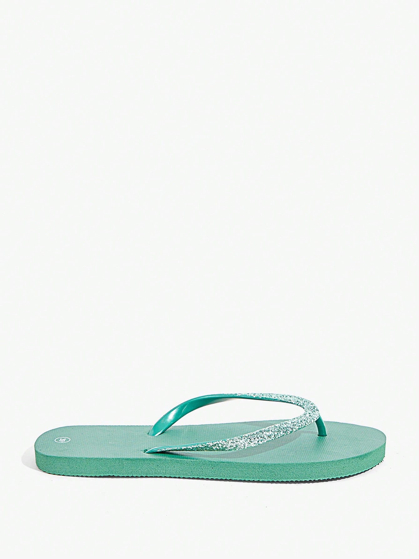 Pair of women’s apricot flat flip-flops with a glitter upper and plain design, suitable for beach, outdoor, home, and vacation wear.