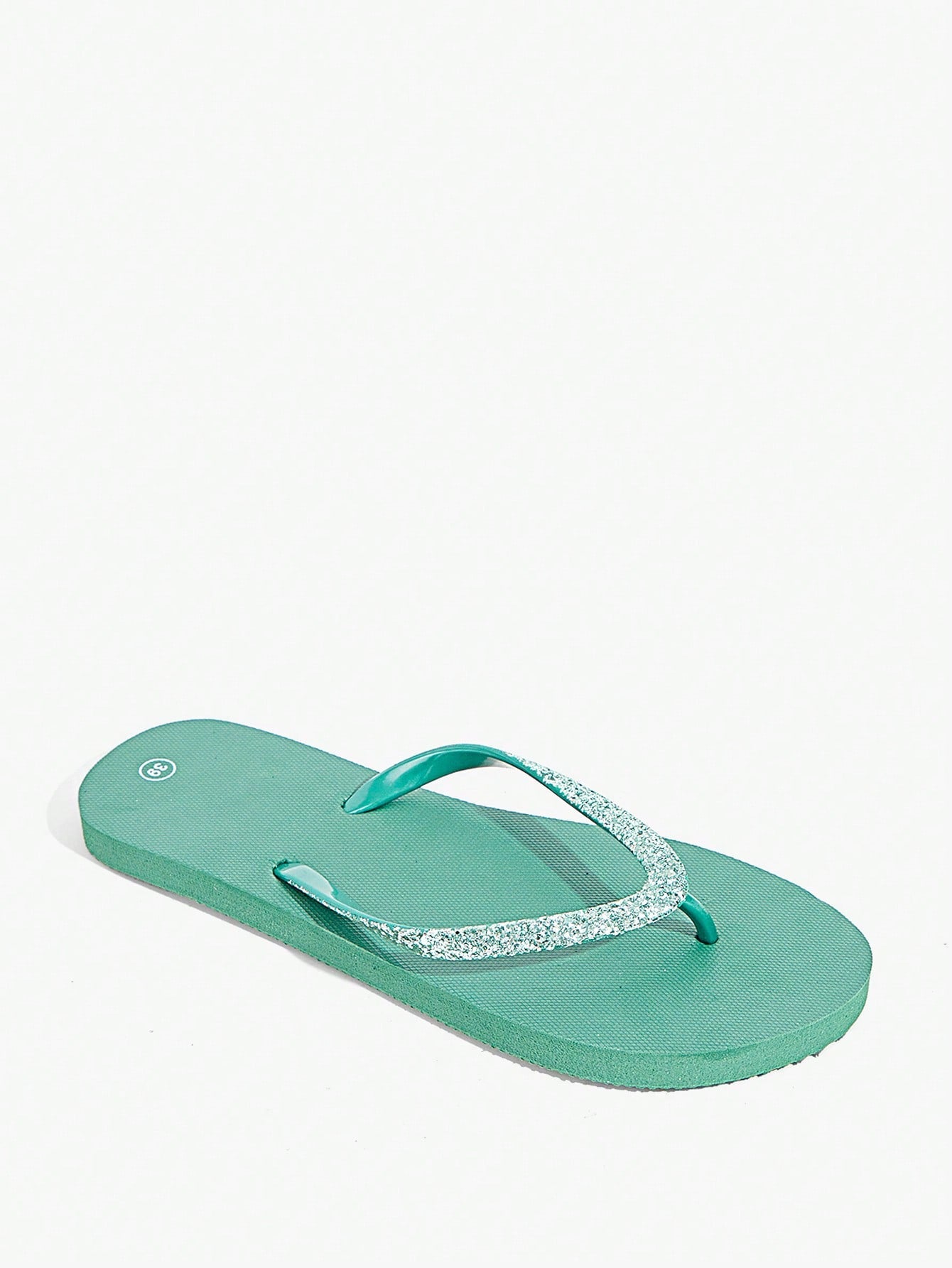 Pair of women’s apricot flat flip-flops with a glitter upper and plain design, suitable for beach, outdoor, home, and vacation wear.