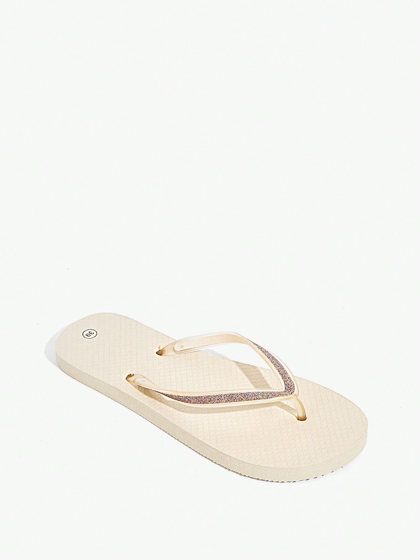 Pair of women’s apricot flat flip-flops with a glitter upper and plain design, suitable for beach, outdoor, home, and vacation wear.