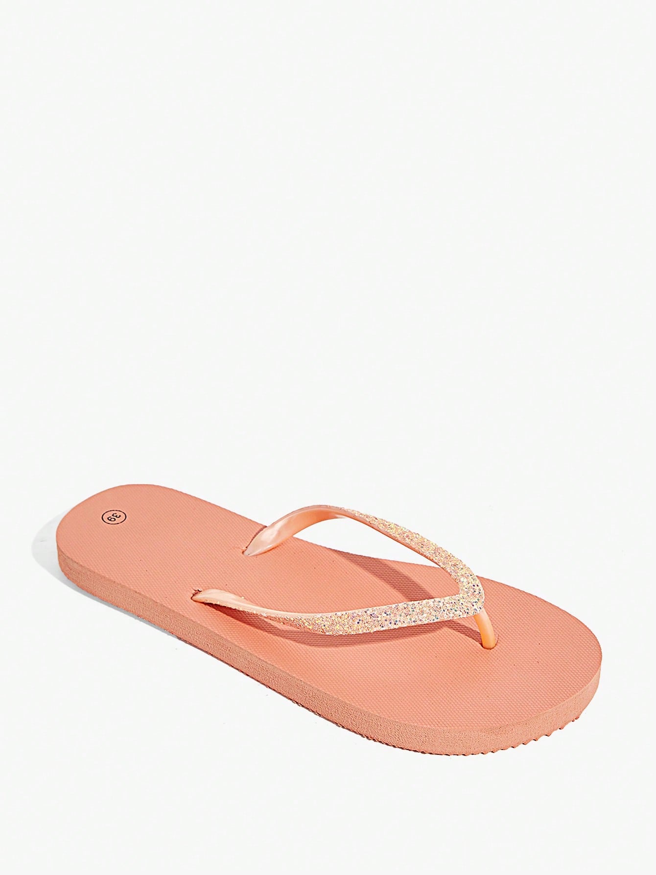 Pair of women’s apricot flat flip-flops with a glitter upper and plain design, suitable for beach, outdoor, home, and vacation wear.