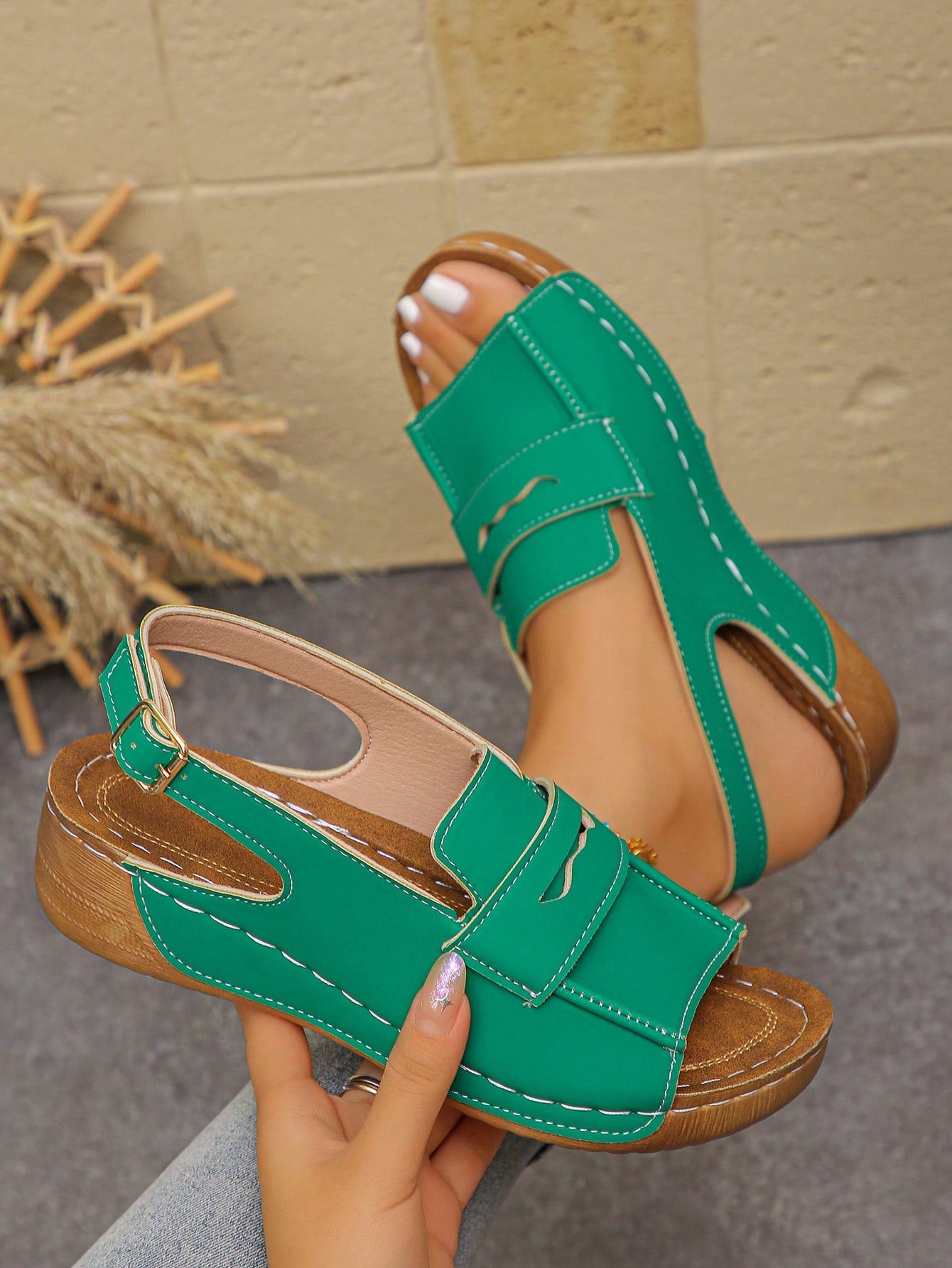 Women's open-toe wedge slide sandals with studded hollow-out upper, cross-over straps, buckle closure, and thick soft sole