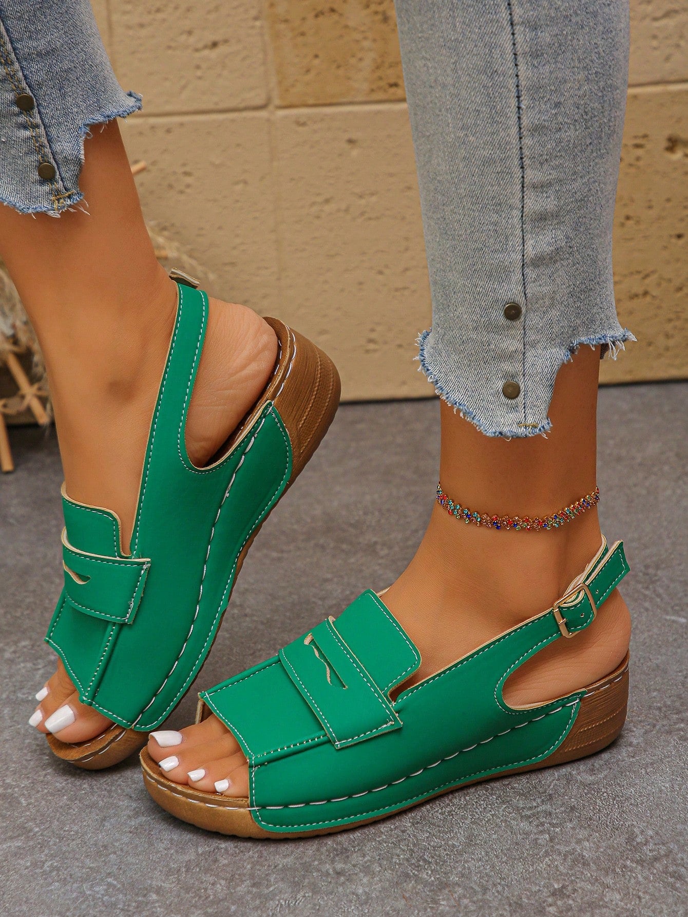 Women's open-toe wedge slide sandals with studded hollow-out upper, cross-over straps, buckle closure, and thick soft sole