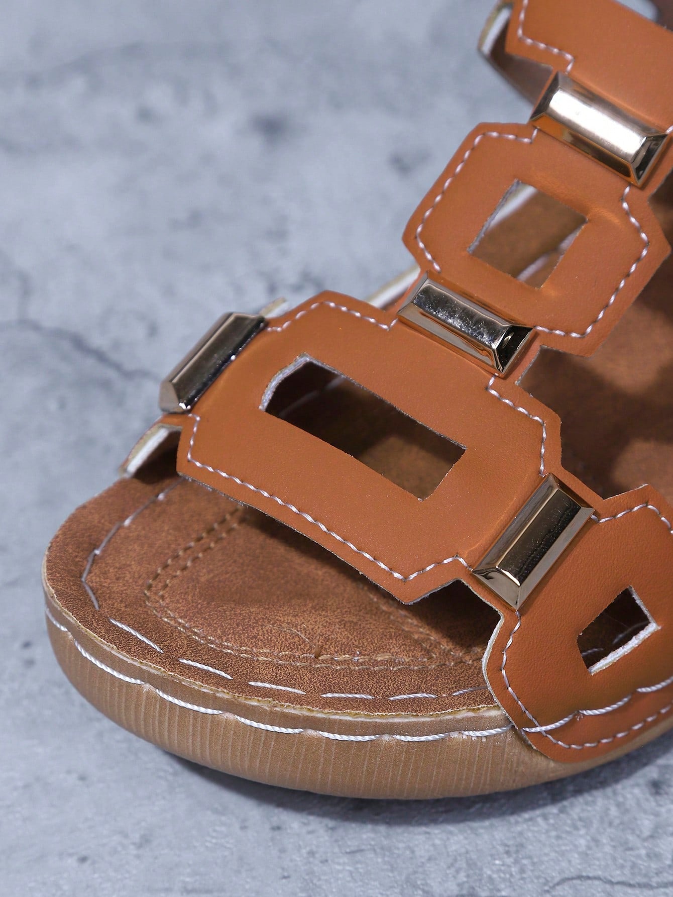 Women's open-toe wedge slide sandals with studded hollow-out upper, cross-over straps, buckle closure, and thick soft sole