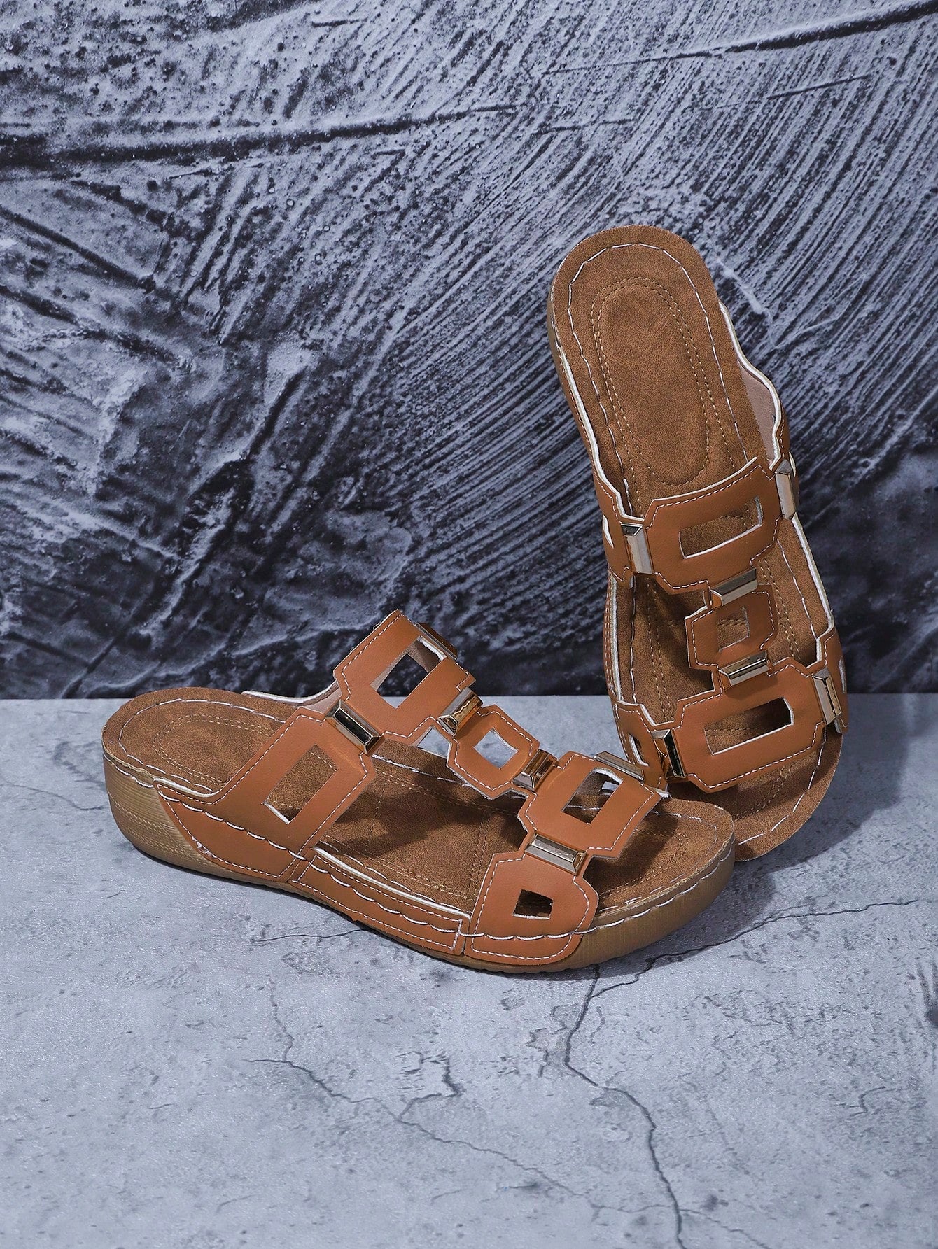 Women's open-toe wedge slide sandals with studded hollow-out upper, cross-over straps, buckle closure, and thick soft sole