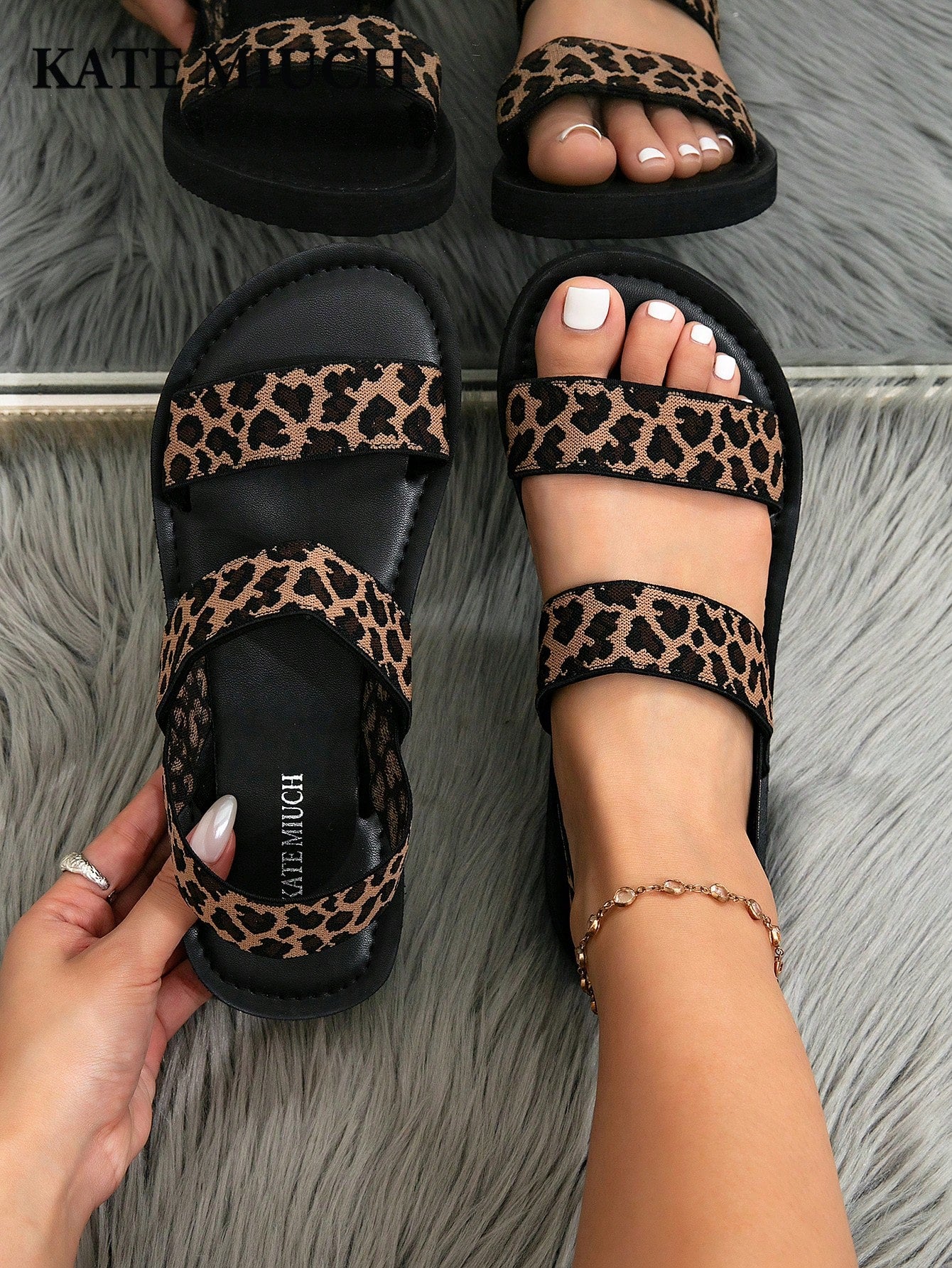 Women's flat slide sandals with ruched fabric, bow accent, and fringe detail, suitable for outdoor vacation wear.