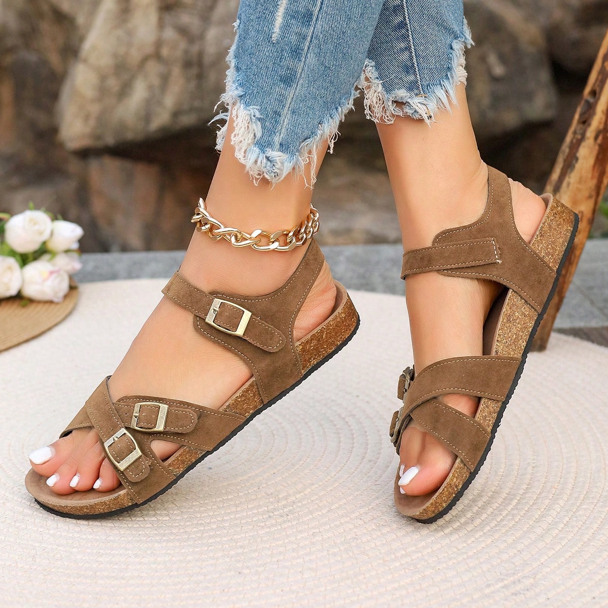 Women's plus size slip-on gladiator flat sandals with open toe and buckle detail, designed for beach and vacation wear.