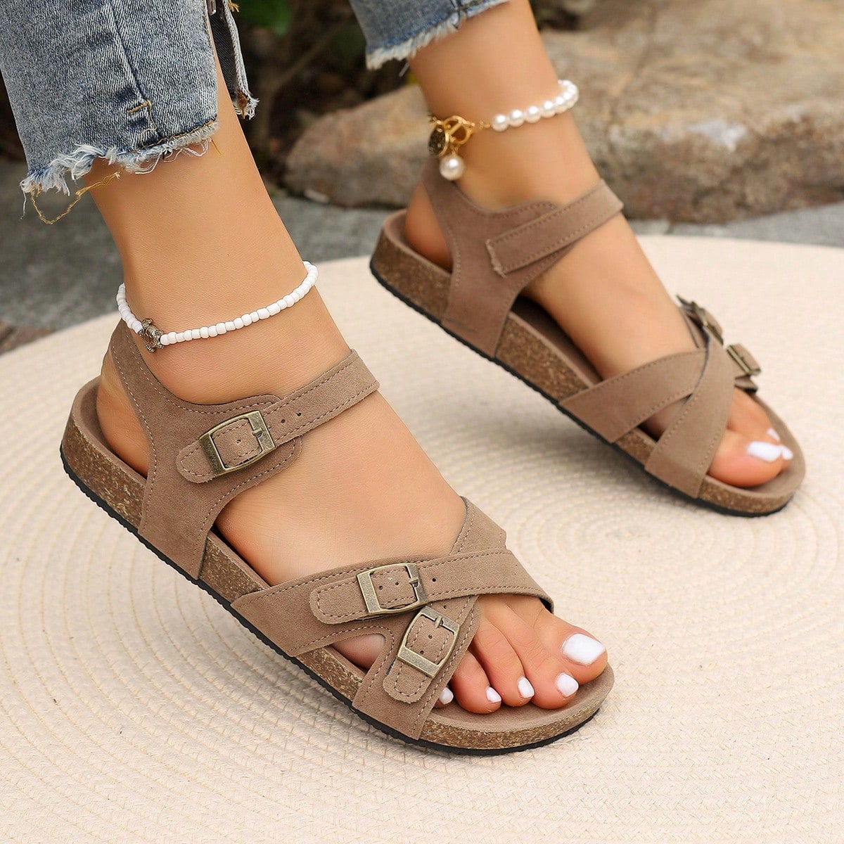 Women's plus size slip-on gladiator flat sandals with open toe and buckle detail, designed for beach and vacation wear.