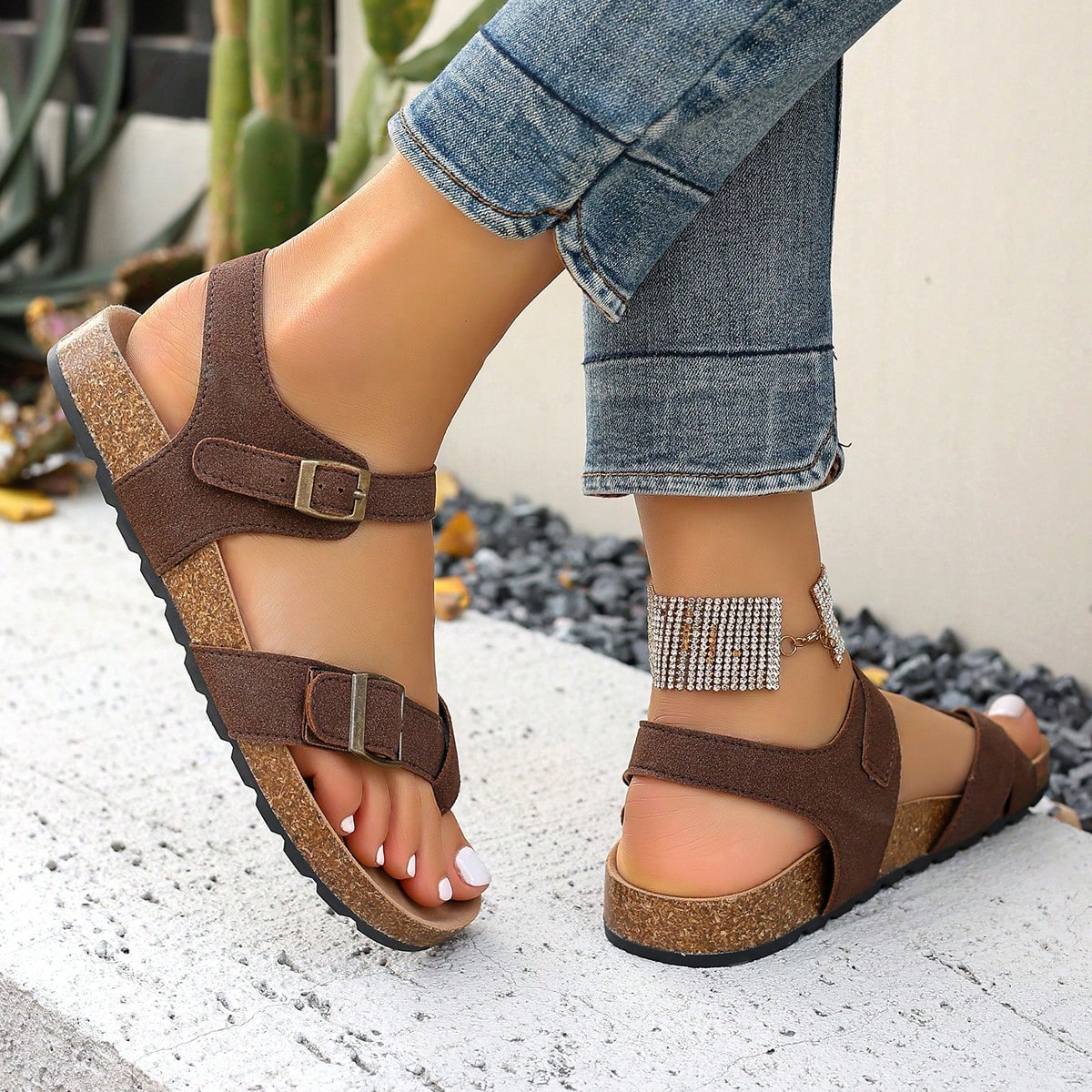 Women's plus size slip-on gladiator flat sandals with open toe and buckle detail, designed for beach and vacation wear.