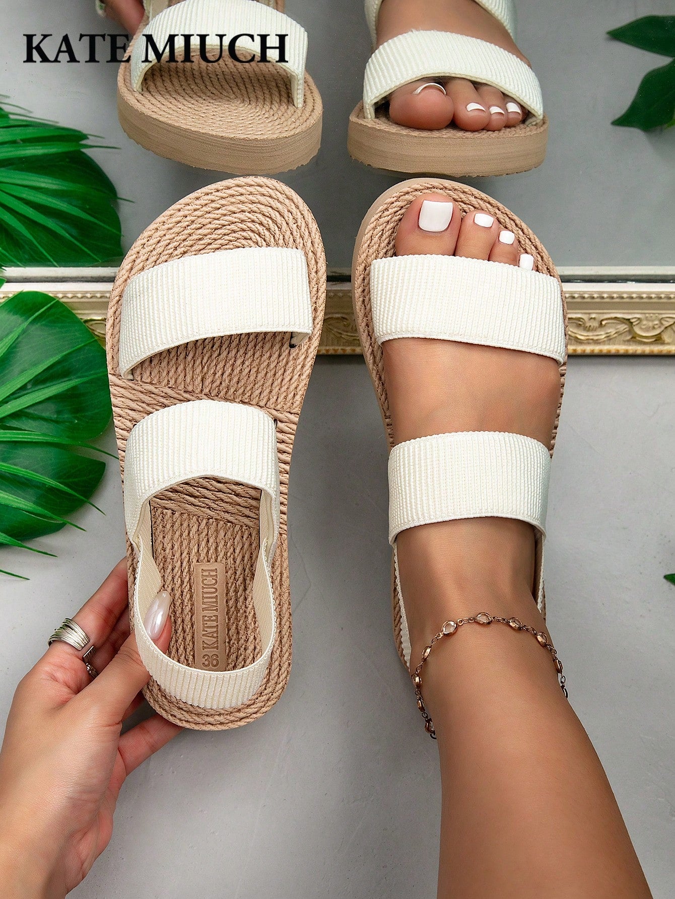 Women's black flat gladiator sandals with ruched and ruffle trim, textured fabric upper, and open-toe design for party, outdoor, and casual wear.