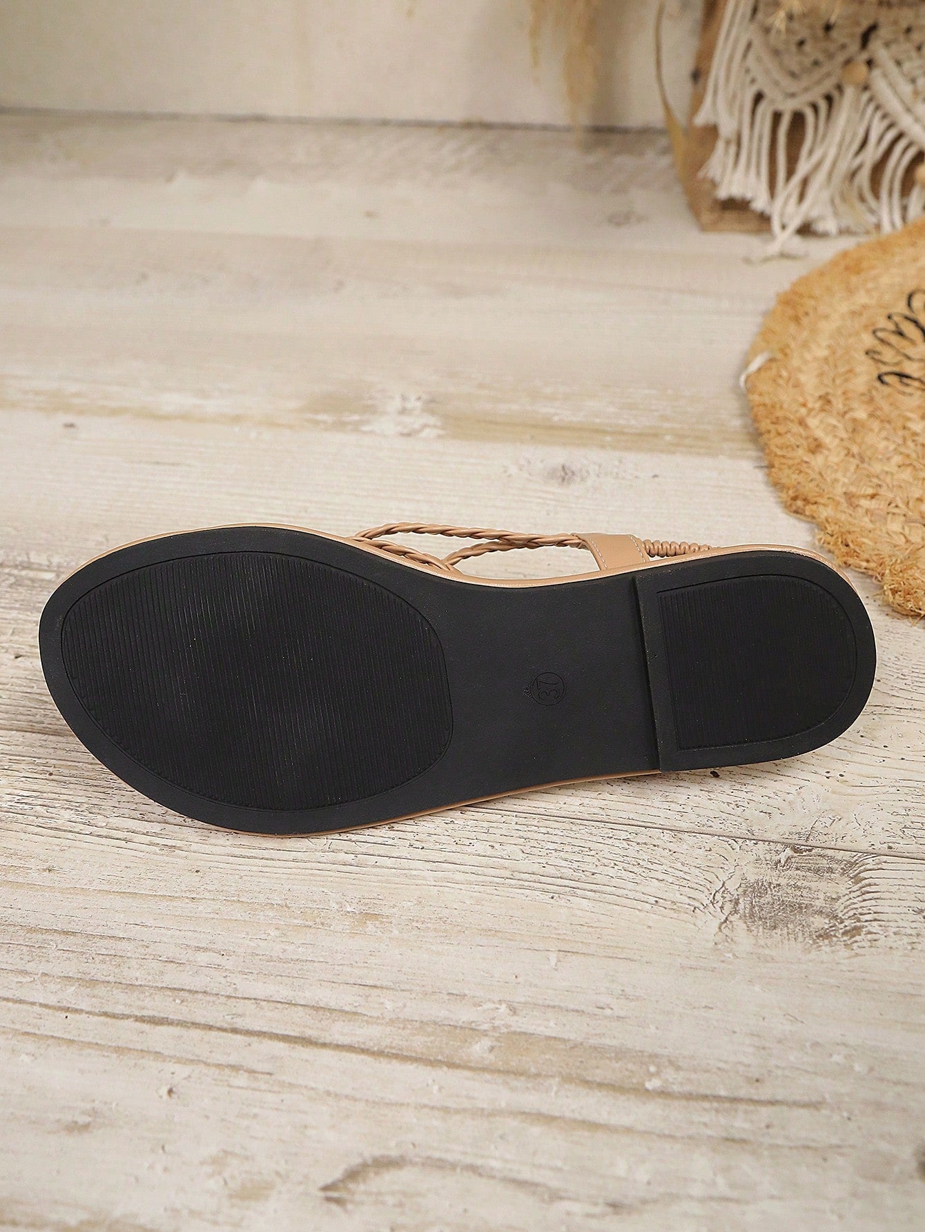 Open-toe flat slide sandals featuring rhinestone leaf decoration in a vacation-inspired style.