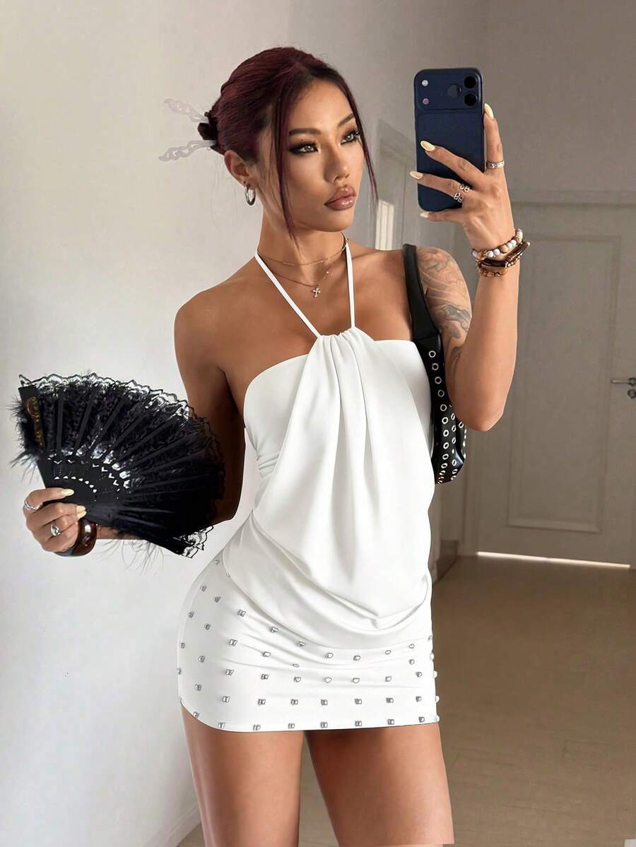 Women's brown beaded halter mini dress with a backless tie-back knot design, sleeveless slim fit silhouette, and pencil hem.