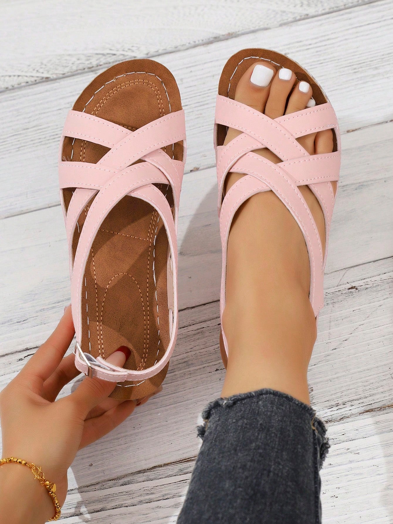 Women's open-toe wedge slide sandals with studded hollow-out upper, cross-over straps, buckle closure, and thick soft sole