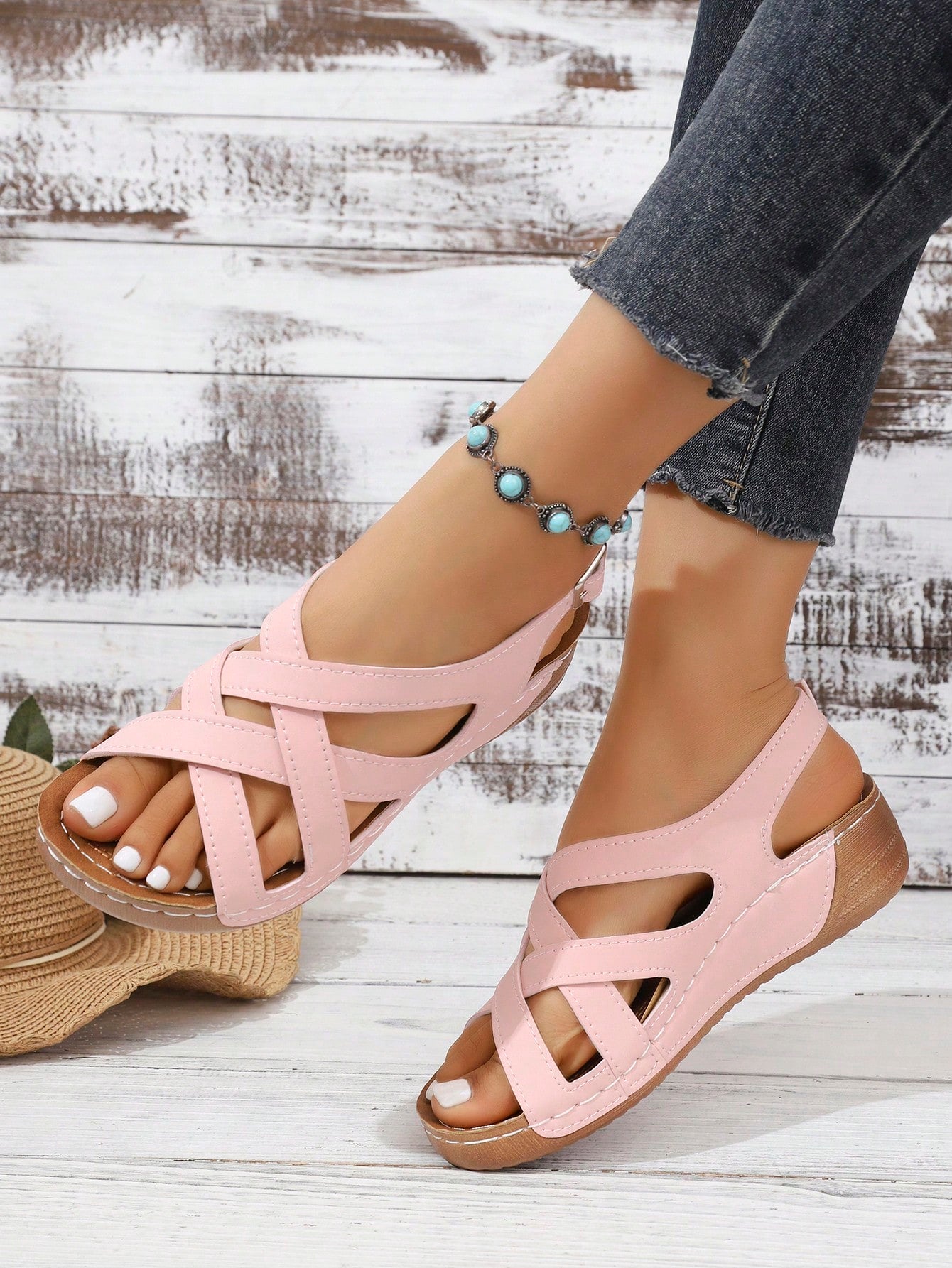 Women's open-toe wedge slide sandals with studded hollow-out upper, cross-over straps, buckle closure, and thick soft sole