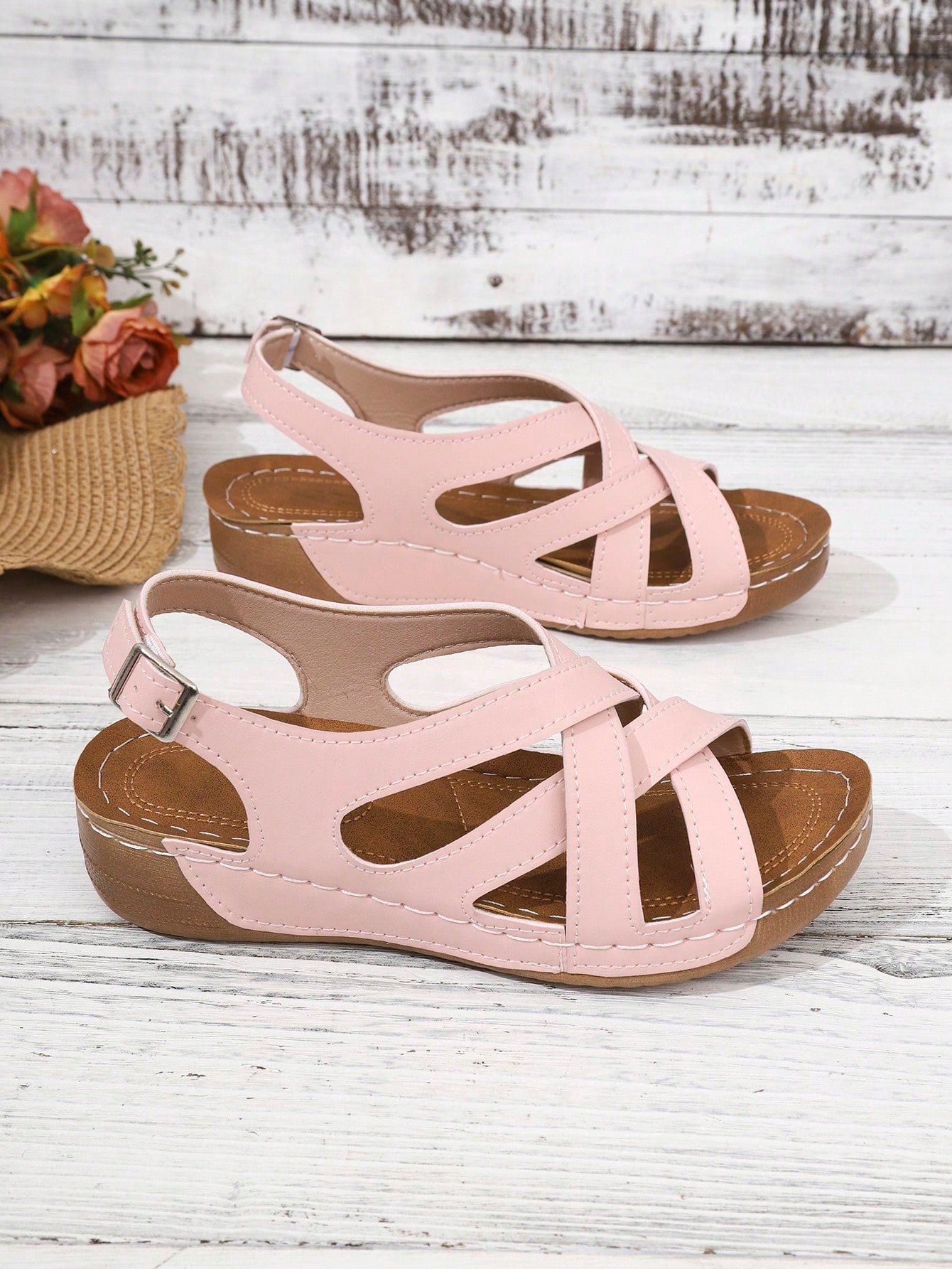 Women's open-toe wedge slide sandals with studded hollow-out upper, cross-over straps, buckle closure, and thick soft sole