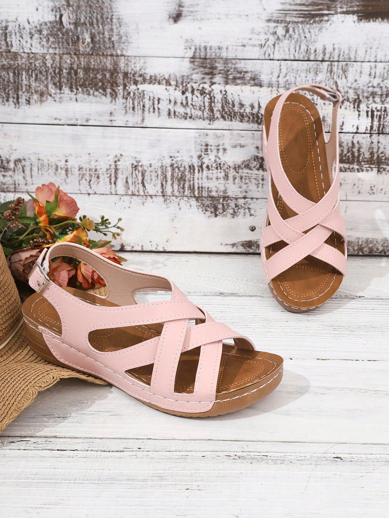 Women's open-toe wedge slide sandals with studded hollow-out upper, cross-over straps, buckle closure, and thick soft sole