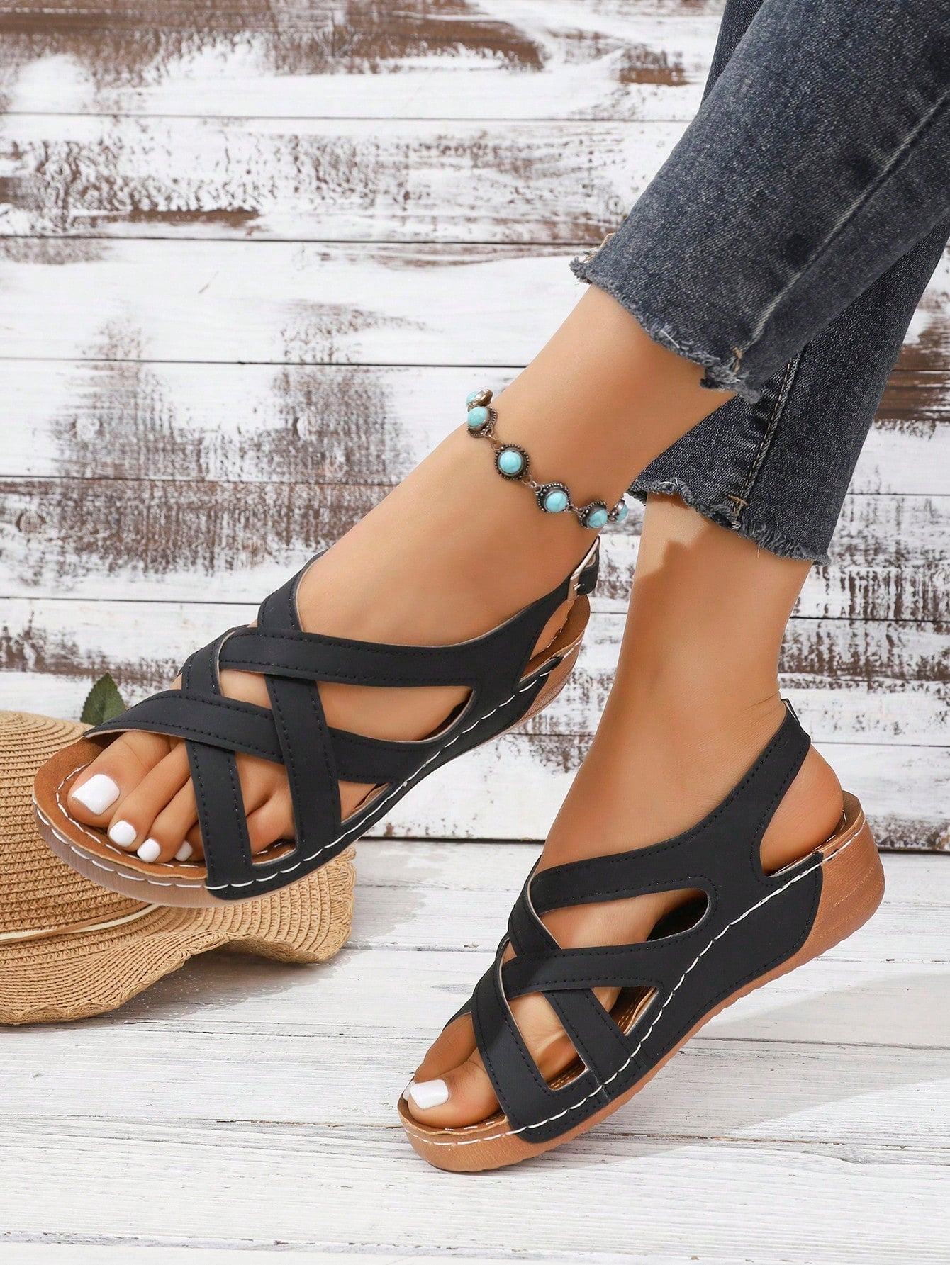 Women's open-toe wedge slide sandals with studded hollow-out upper, cross-over straps, buckle closure, and thick soft sole