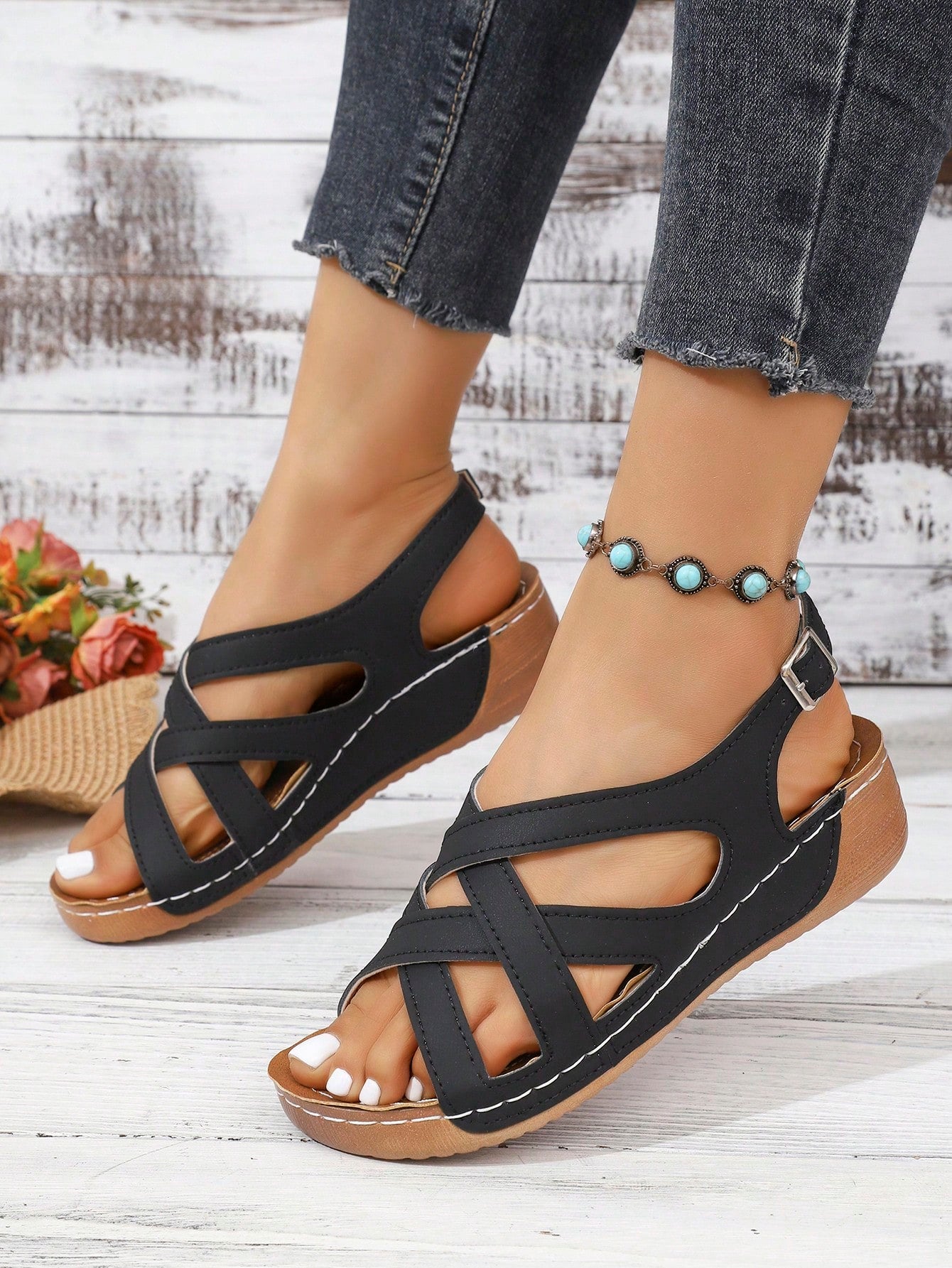 Women's open-toe wedge slide sandals with studded hollow-out upper, cross-over straps, buckle closure, and thick soft sole