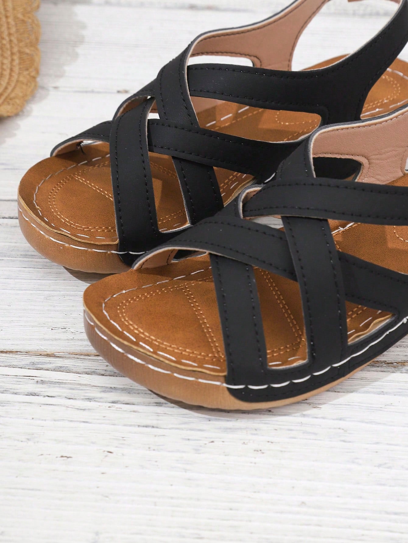 Women's open-toe wedge slide sandals with studded hollow-out upper, cross-over straps, buckle closure, and thick soft sole