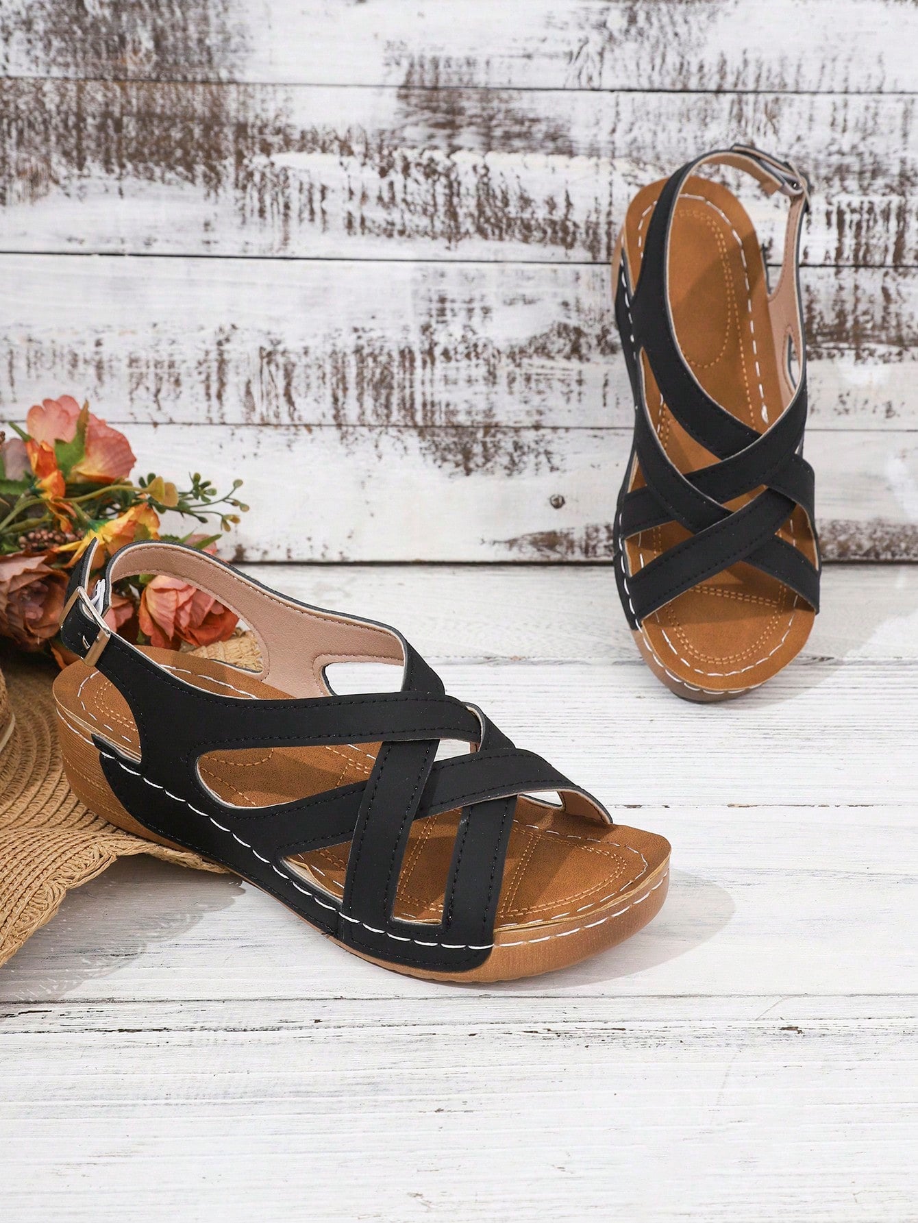 Women's open-toe wedge slide sandals with studded hollow-out upper, cross-over straps, buckle closure, and thick soft sole
