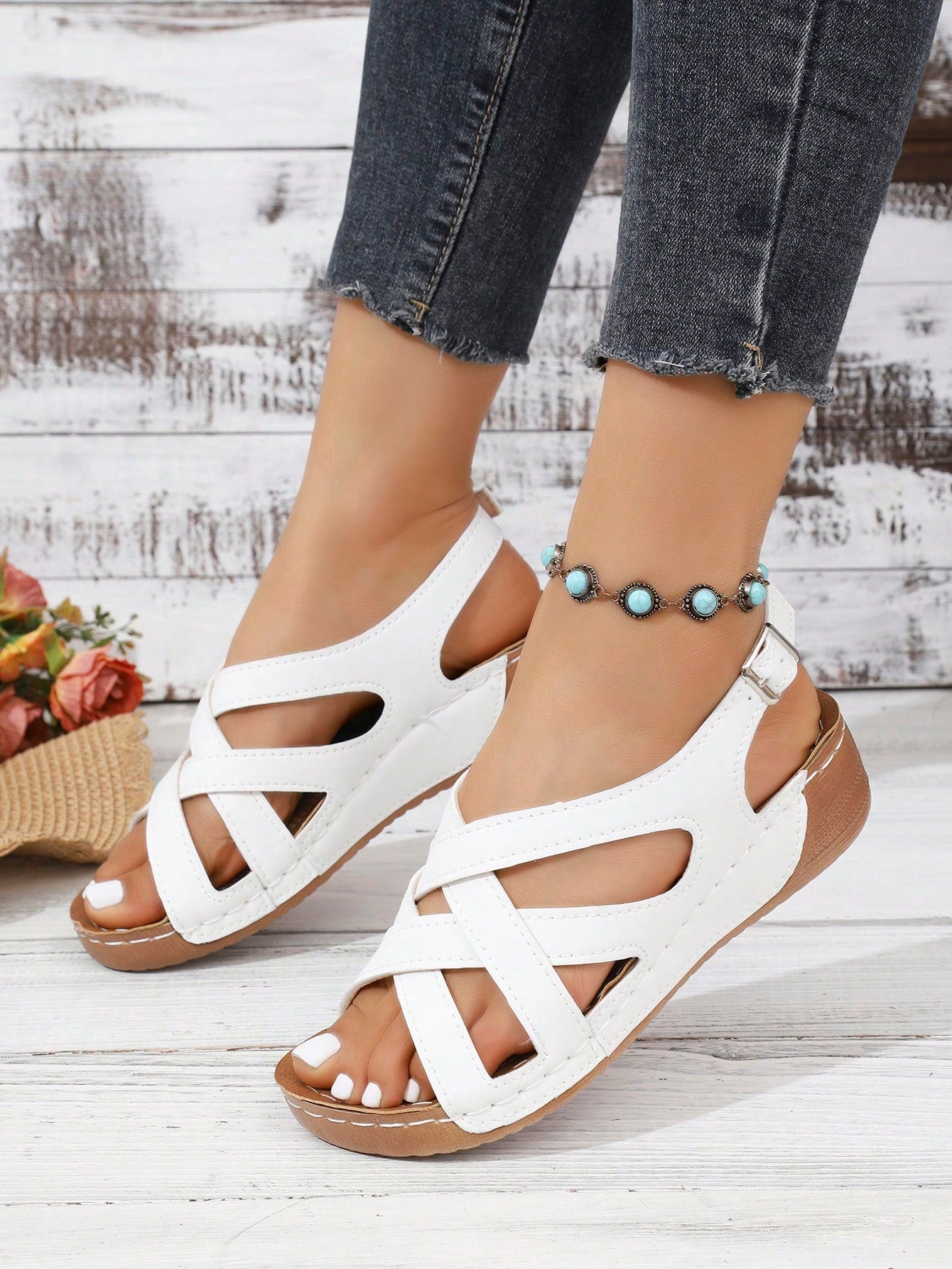 Women's open-toe wedge slide sandals with studded hollow-out upper, cross-over straps, buckle closure, and thick soft sole