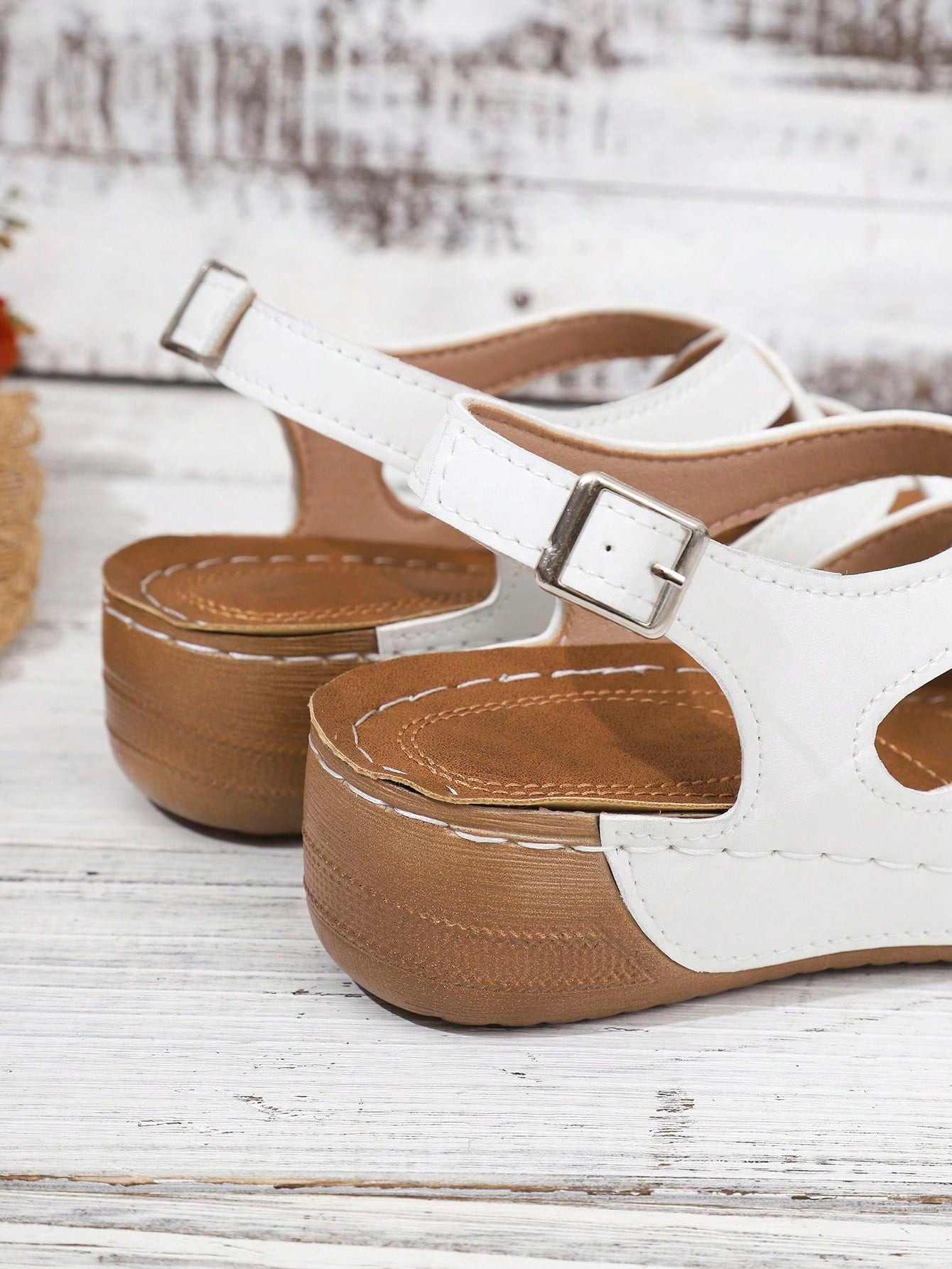 Women's open-toe wedge slide sandals with studded hollow-out upper, cross-over straps, buckle closure, and thick soft sole