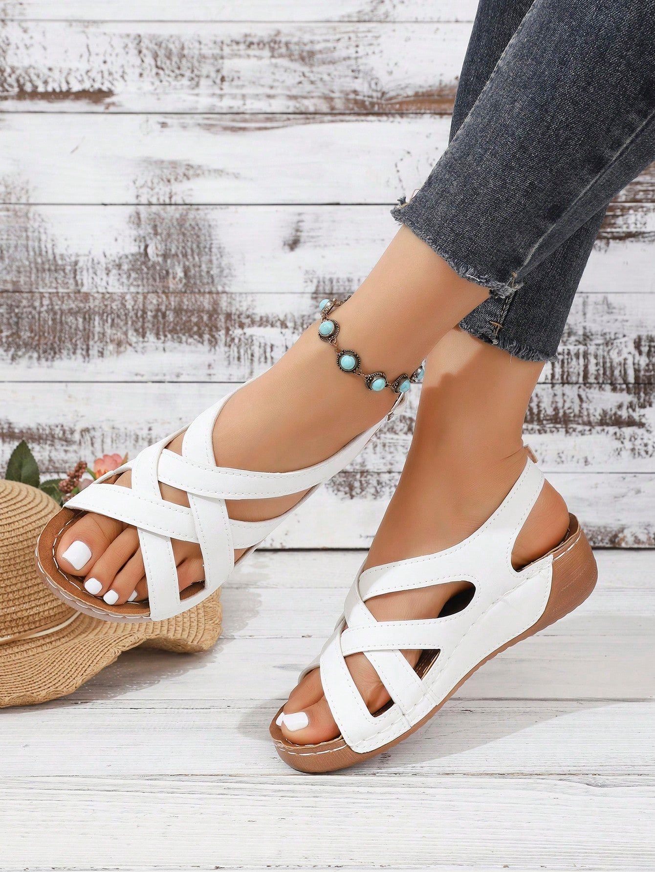 Women's open-toe wedge slide sandals with studded hollow-out upper, cross-over straps, buckle closure, and thick soft sole