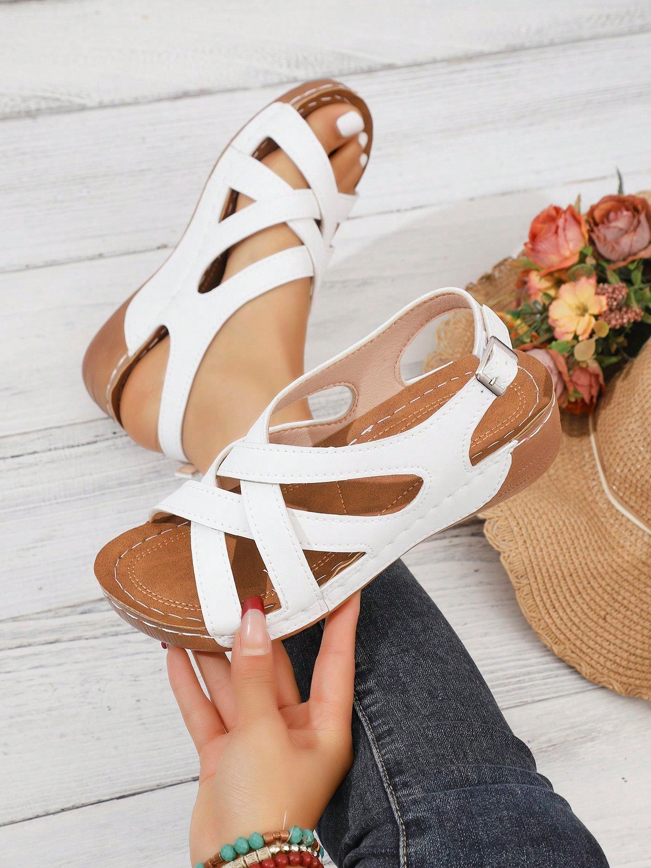 Women's open-toe wedge slide sandals with studded hollow-out upper, cross-over straps, buckle closure, and thick soft sole