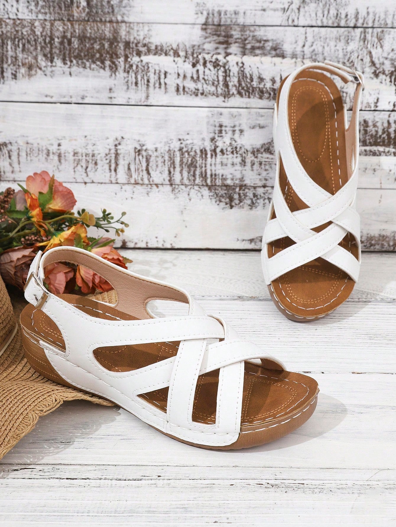 Women's open-toe wedge slide sandals with studded hollow-out upper, cross-over straps, buckle closure, and thick soft sole