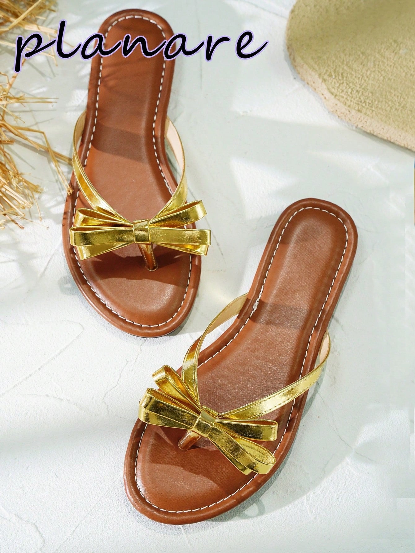 Women’s flat slide sandals with contrast mesh bow decoration and textured upper, open toe design, and slip-on style for beach and vacation wear.