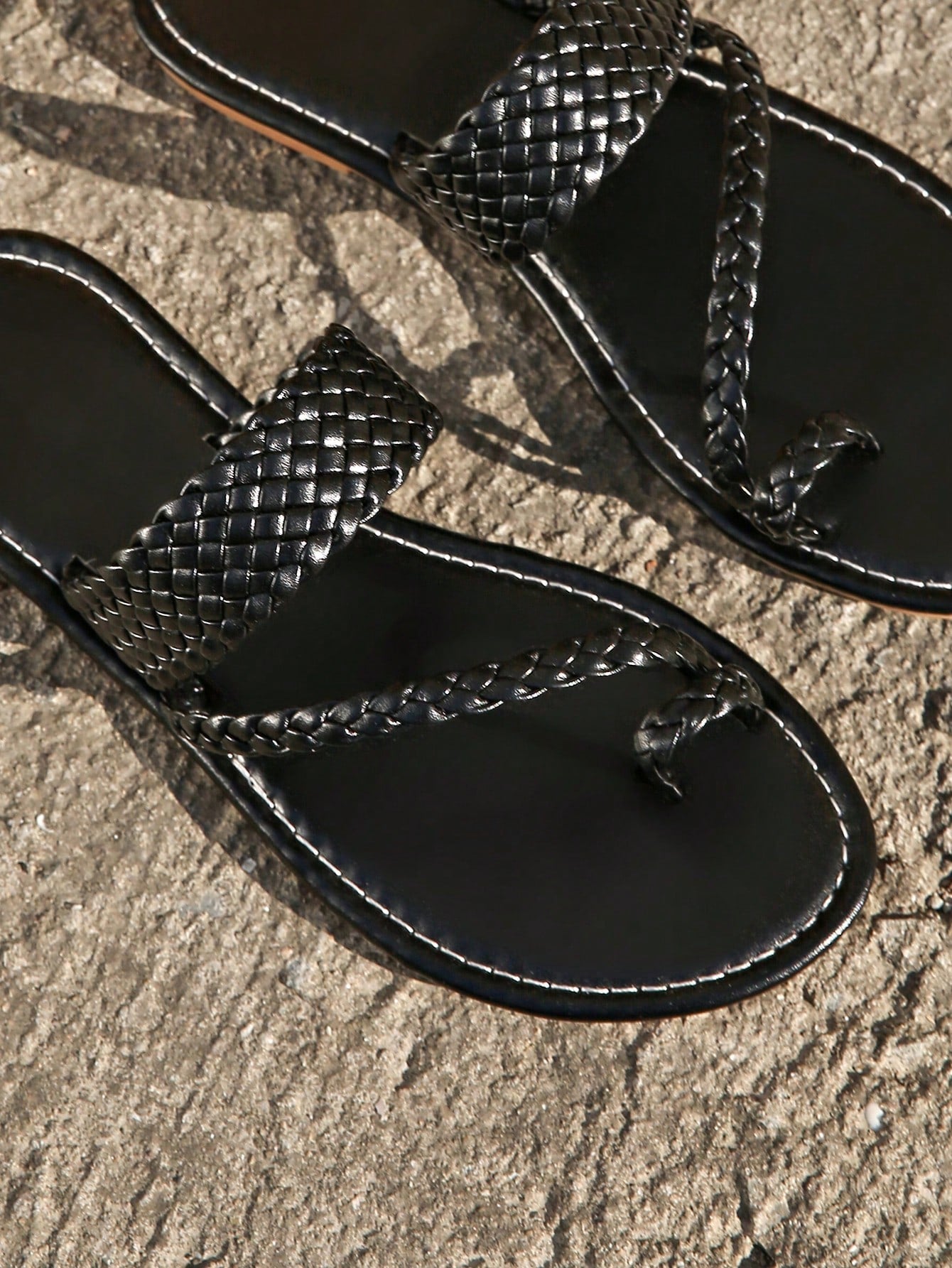 Plus size women's solid gold flat slide sandals with thin criss cross straps, round toe shape, and toe post detail, shown in a lightweight beach-style slip-on design.