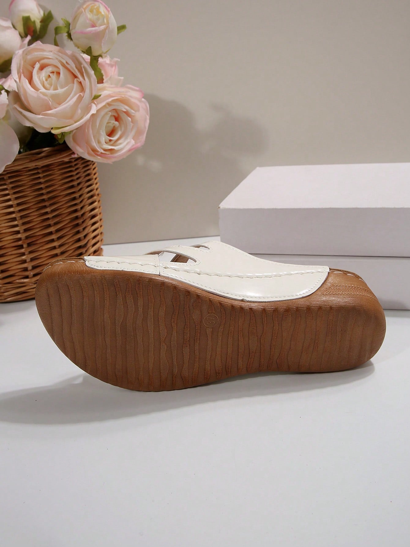 Women's slip-on beach wedge slide sandals with open toe, thick sole, criss-cross straps, and buckle detail
