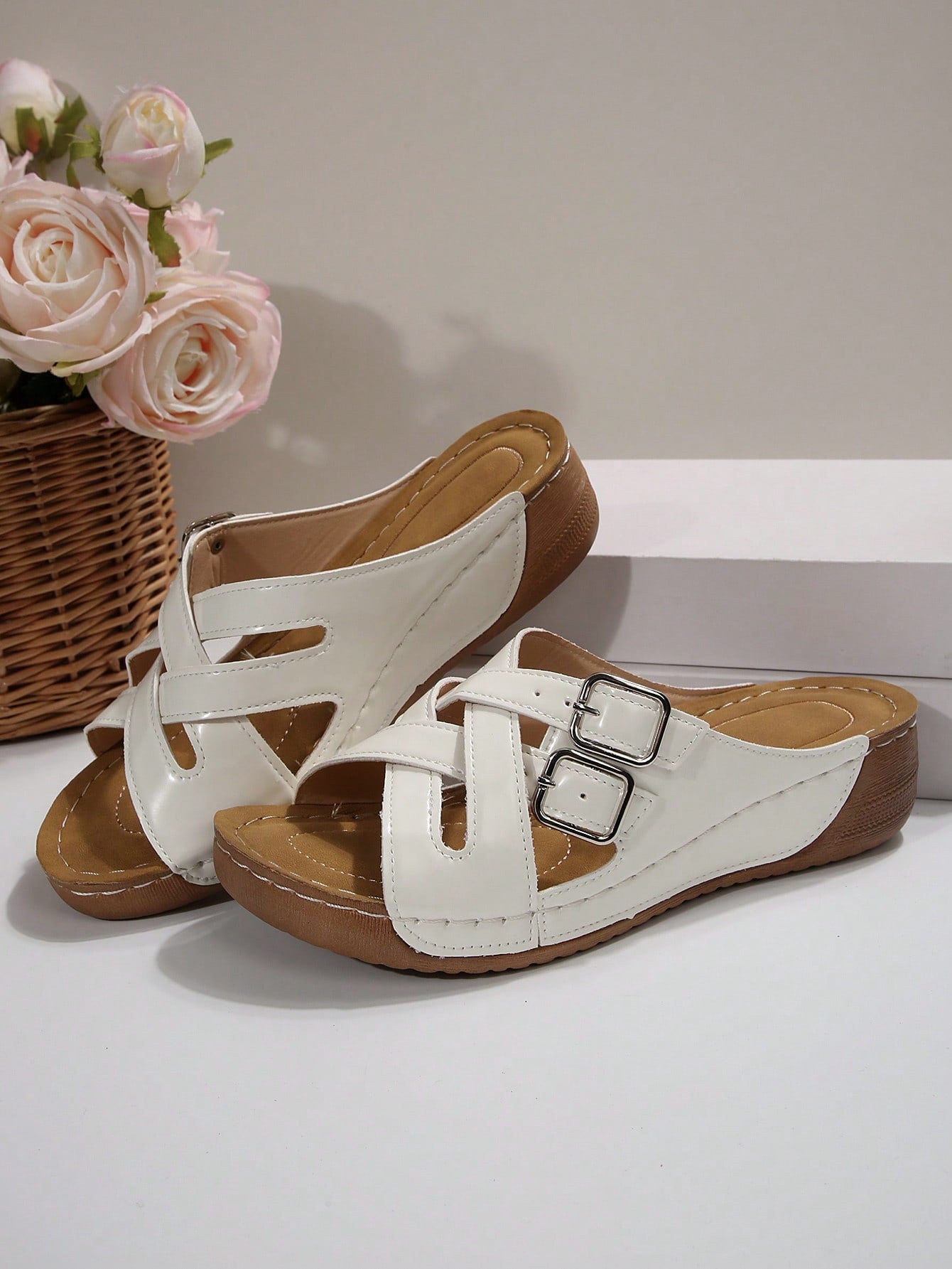 Women's slip-on beach wedge slide sandals with open toe, thick sole, criss-cross straps, and buckle detail