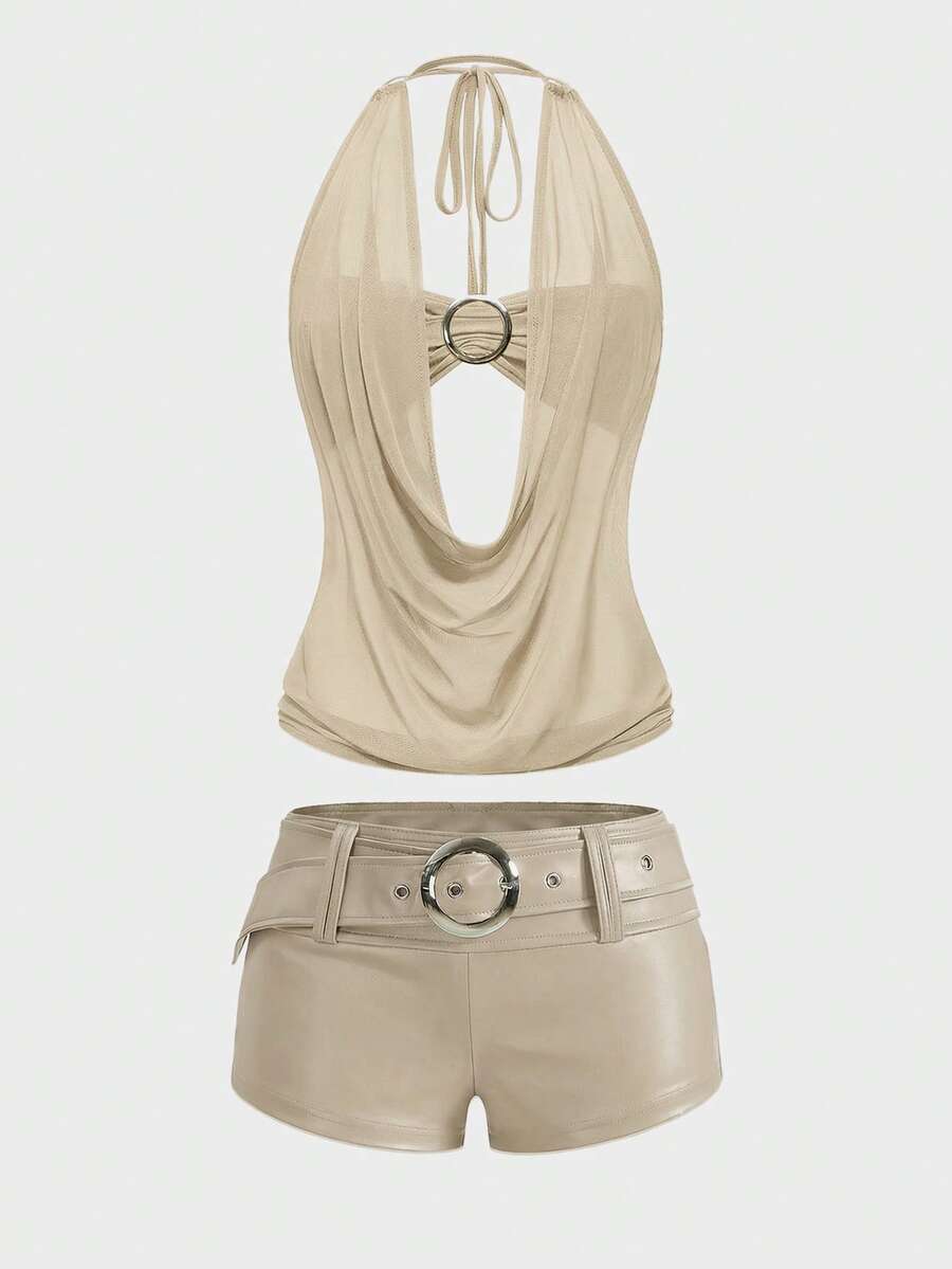 Women's Gyaru-style two-piece outfit with a draped halter crop top, backless tie detail, and mini bodycon shorts