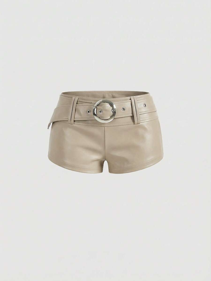 Women's Gyaru-style two-piece outfit with a draped halter crop top, backless tie detail, and mini bodycon shorts