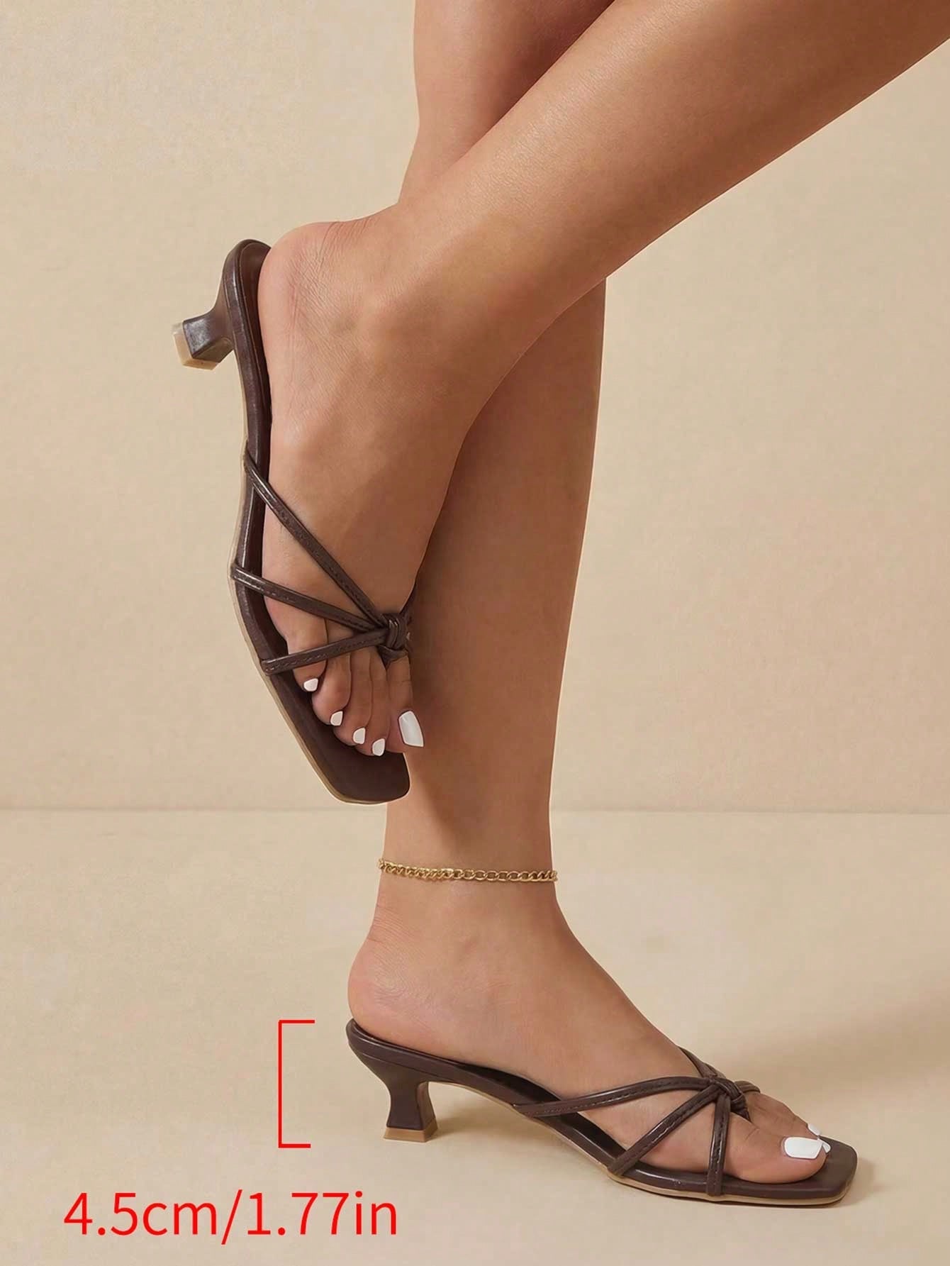Elegant women’s slip-on high heel sandals with a square toe, bowknot detail, textured upper, stiletto heel, and slingback toe-post design.