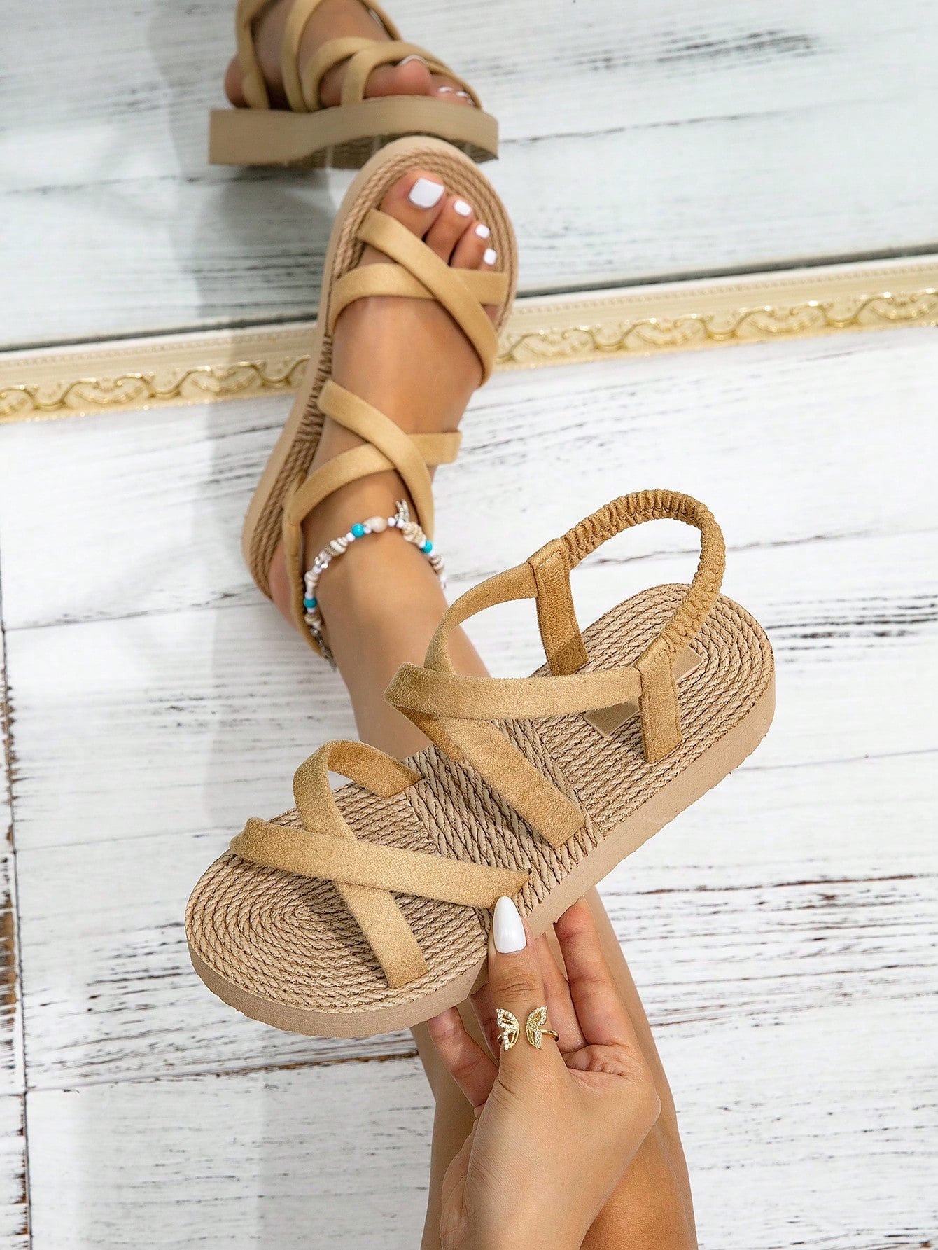 Women's retro-style flat slide sandals with criss-cross straps, open toe, and multicolor geometric print, suitable for casual outdoor and vacation wear.