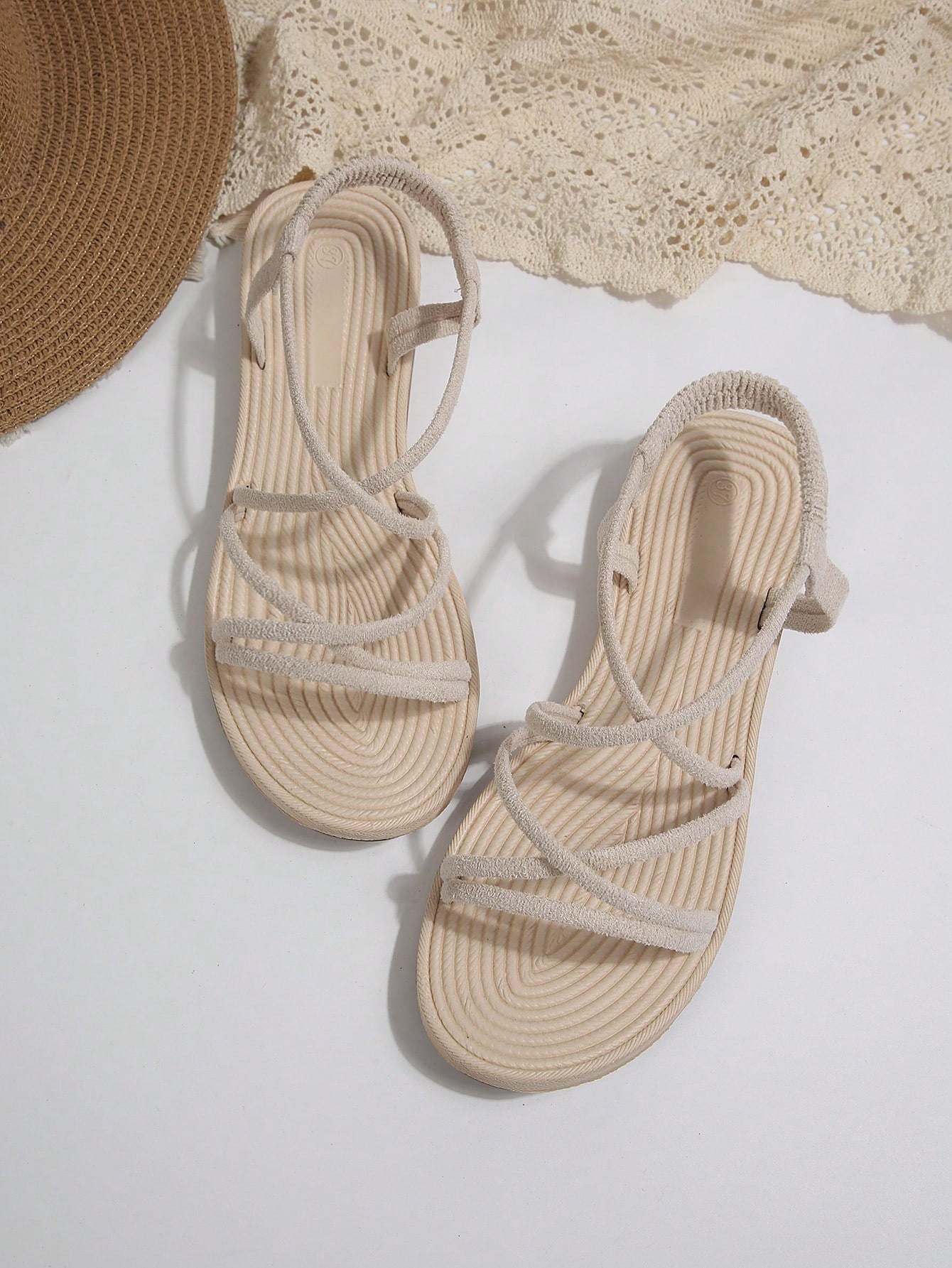 Beige ultra comfy water slide sandals for women and girls with open toe, elastic strap, flat heel, and thick sole, suitable for beach, swimming, hiking, sports, and travel.